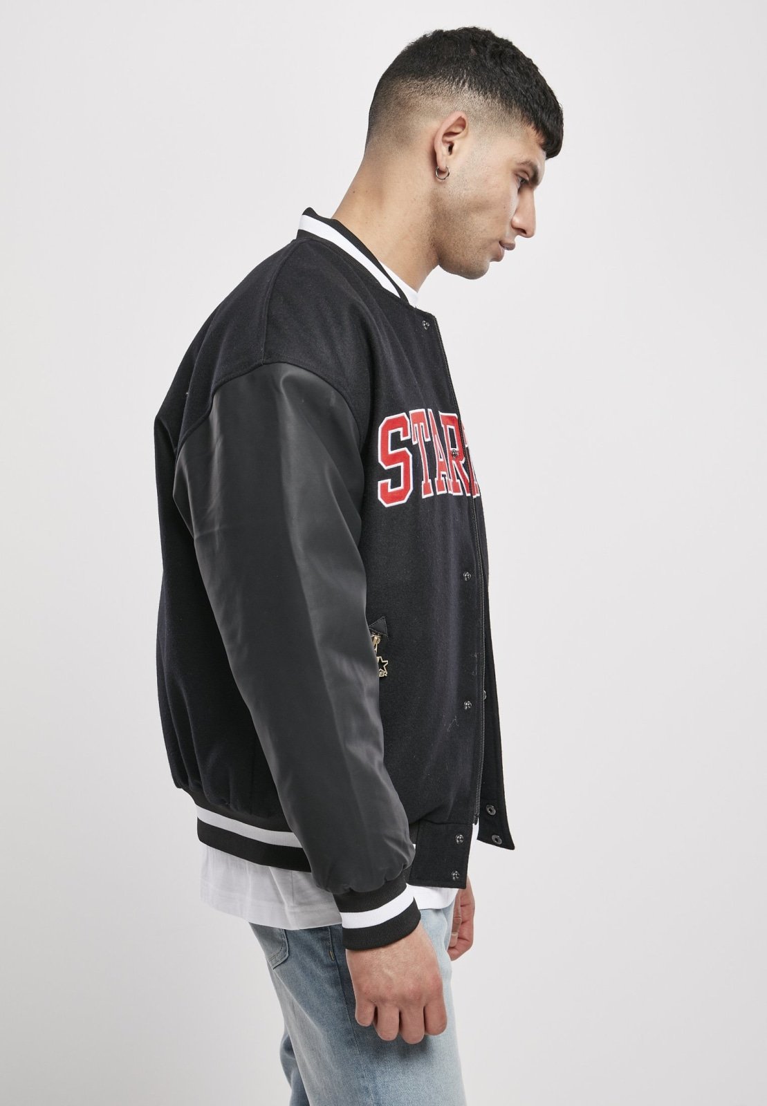 Men's Team Authentic Oldschool College Jacket featuring contrasting sleeves, embroidered branding, and sporty striped cuffs.