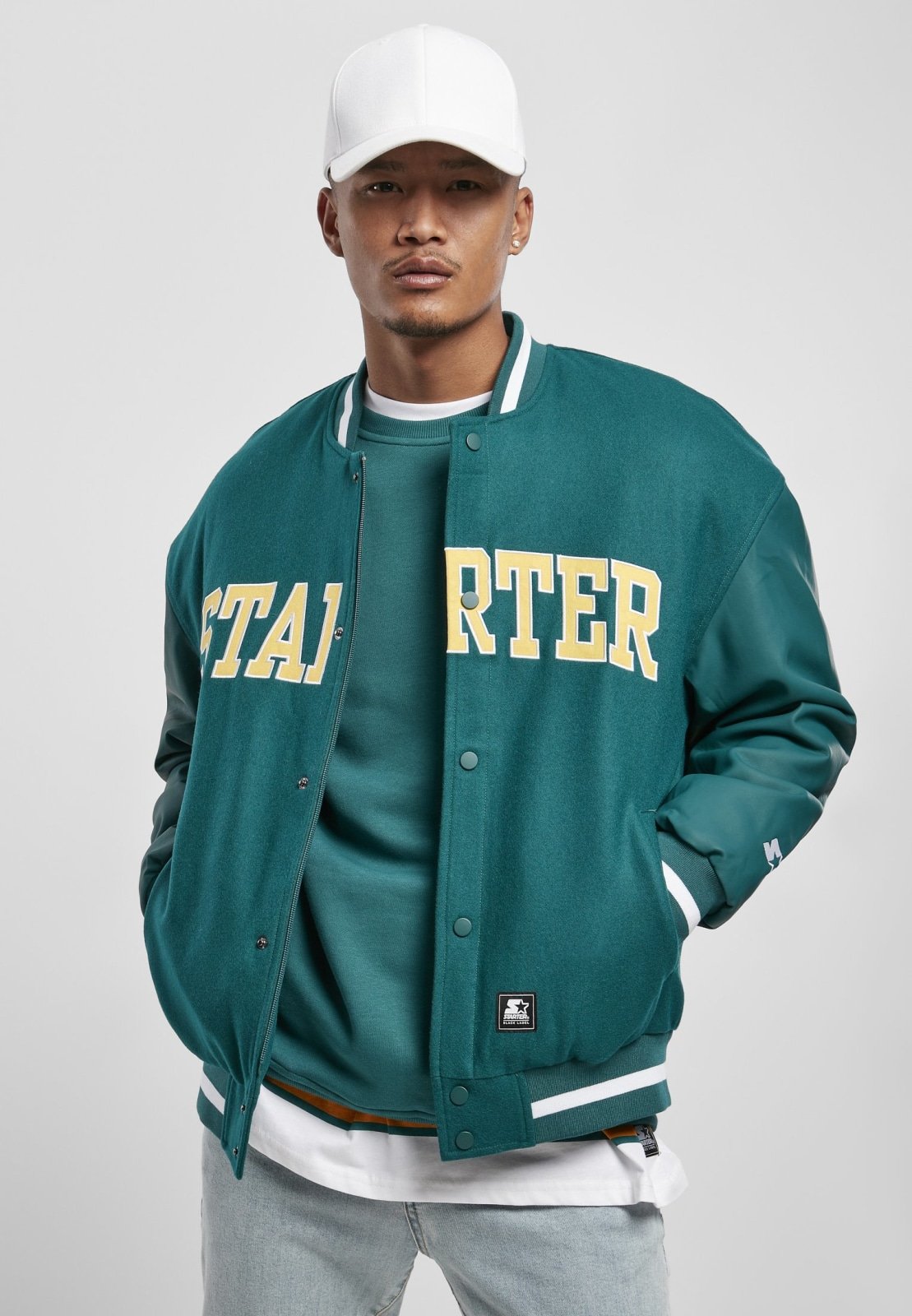 Men's Team Authentic Oldschool College Jacket featuring contrasting sleeves, embroidered branding, and sporty striped cuffs.