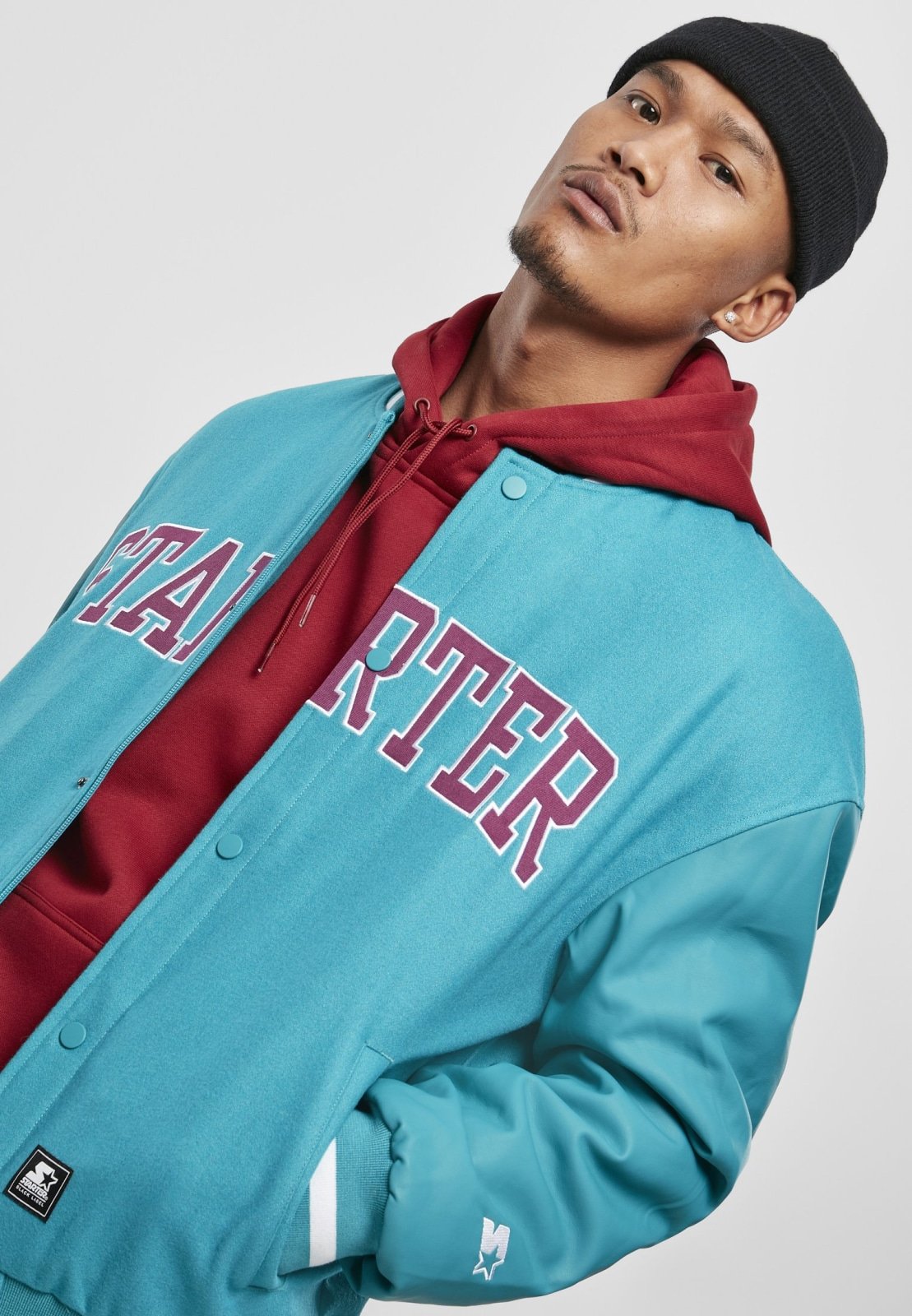 Men's Team Authentic Oldschool College Jacket featuring contrasting sleeves, embroidered branding, and sporty striped cuffs.