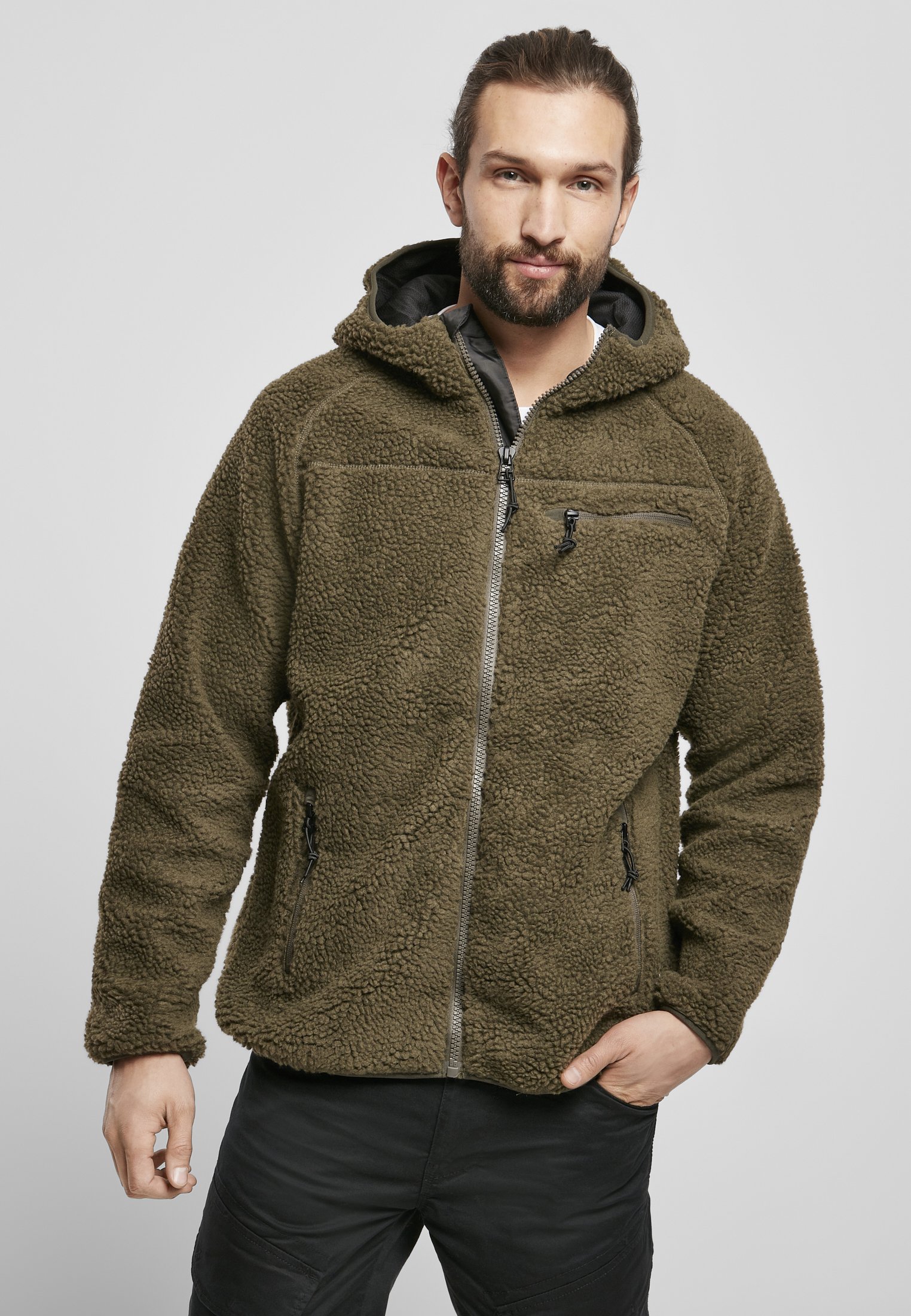 Teddyfleece Worker Jacket showcasing high-pile fleece exterior, zippered pockets, and elastic cuffs in a stylish design.