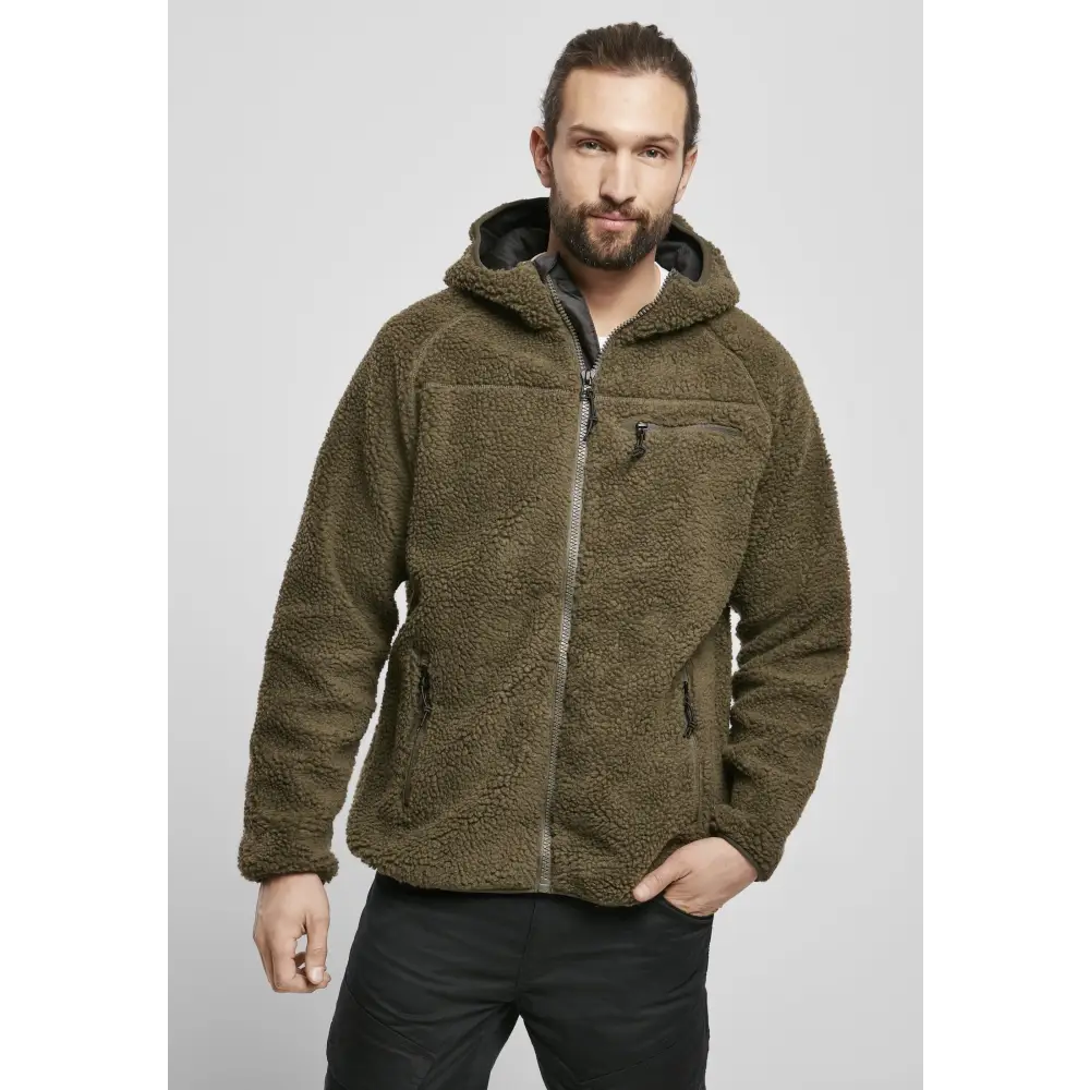 Teddyfleece Worker Jacket showcasing high-pile fleece exterior, zippered pockets, and elastic cuffs in a stylish design.