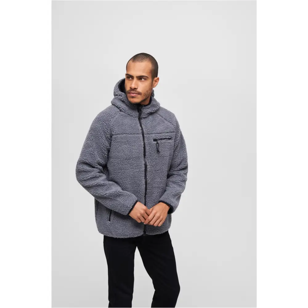 Teddyfleece Worker Jacket showcasing high-pile fleece exterior, zippered pockets, and elastic cuffs in a stylish design.