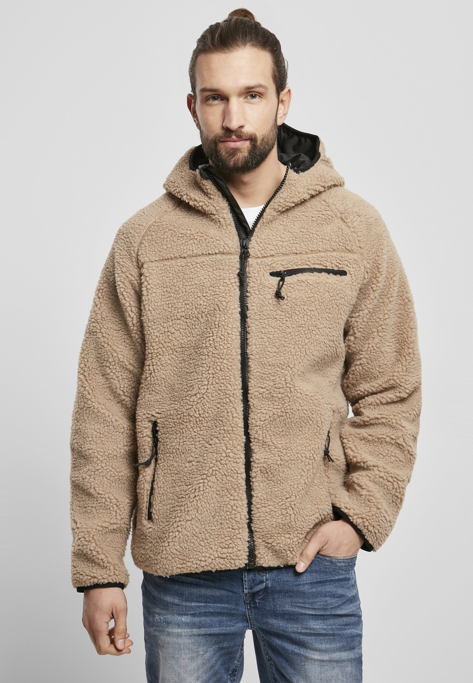 Teddyfleece Worker Jacket showcasing high-pile fleece exterior, zippered pockets, and elastic cuffs in a stylish design.