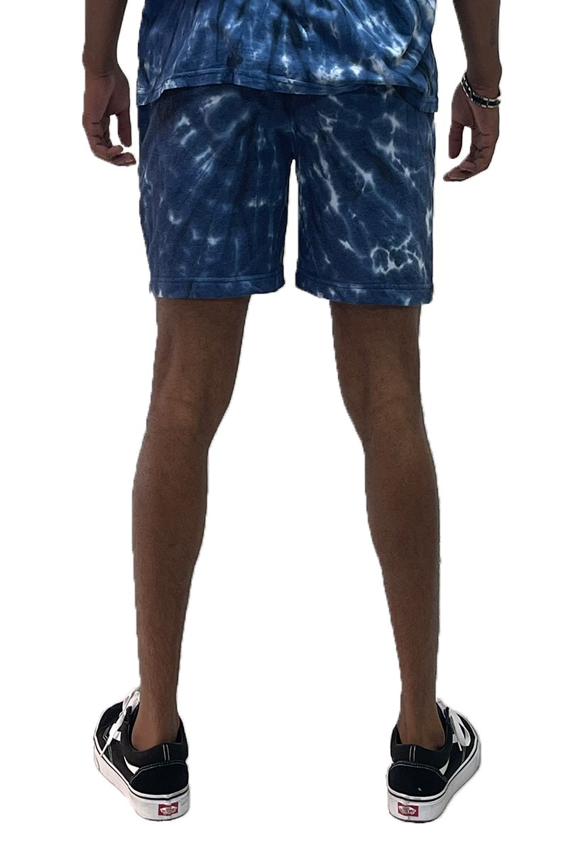 A pair of Tied Up Tye Dye Shorts featuring an elastic waist, drawstring, and pockets, showcasing a colorful tie-dye pattern.