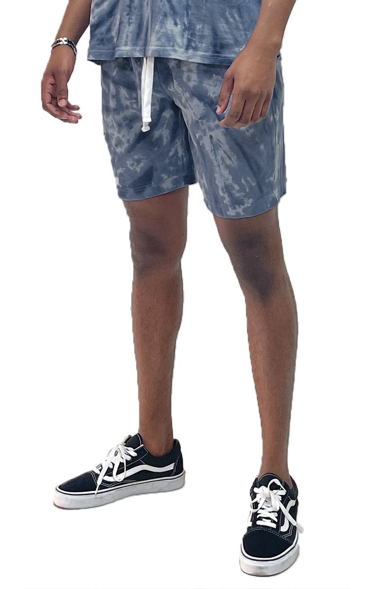 A pair of Tied Up Tye Dye Shorts featuring an elastic waist, drawstring, and pockets, showcasing a colorful tie-dye pattern.