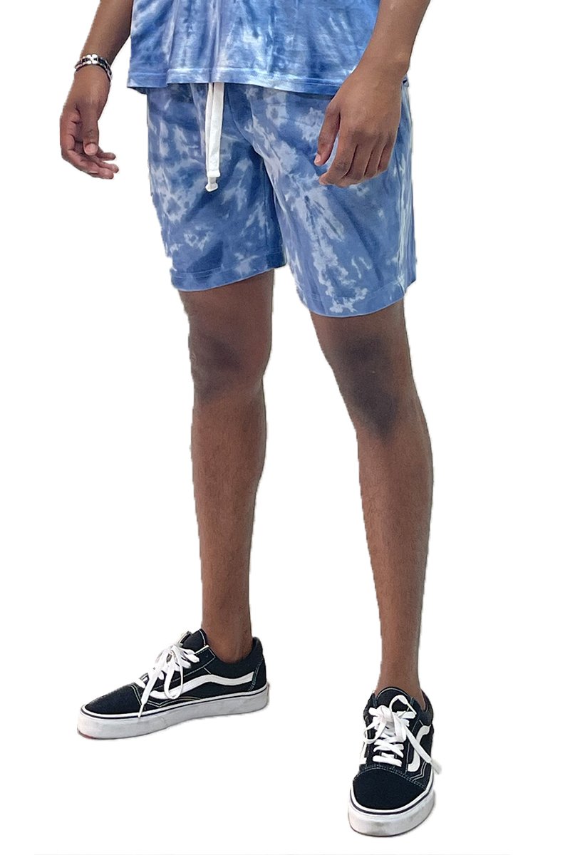 A pair of Tied Up Tye Dye Shorts featuring an elastic waist, drawstring, and pockets, showcasing a colorful tie-dye pattern.