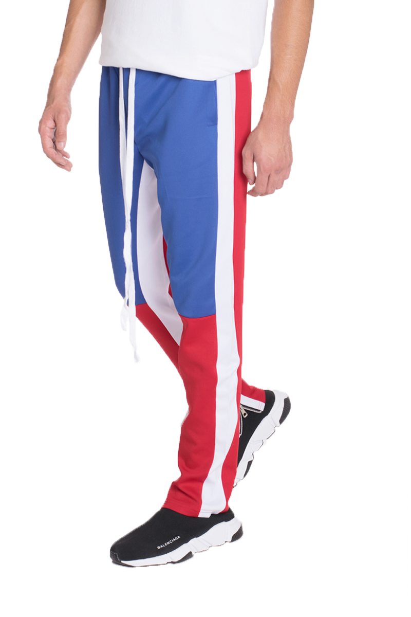 TP0555 Color Block Slim Fit Track Pants featuring a modern design with elastic waistband and zippered pockets.