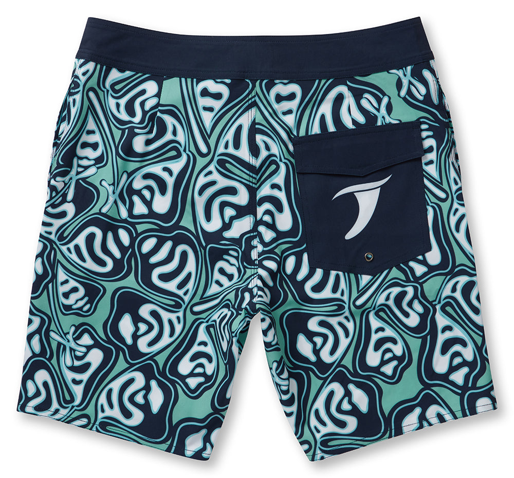 Tropical green and blue Hibiscus boardshorts with a drawstring waistband and three pockets, perfect for beach activities.