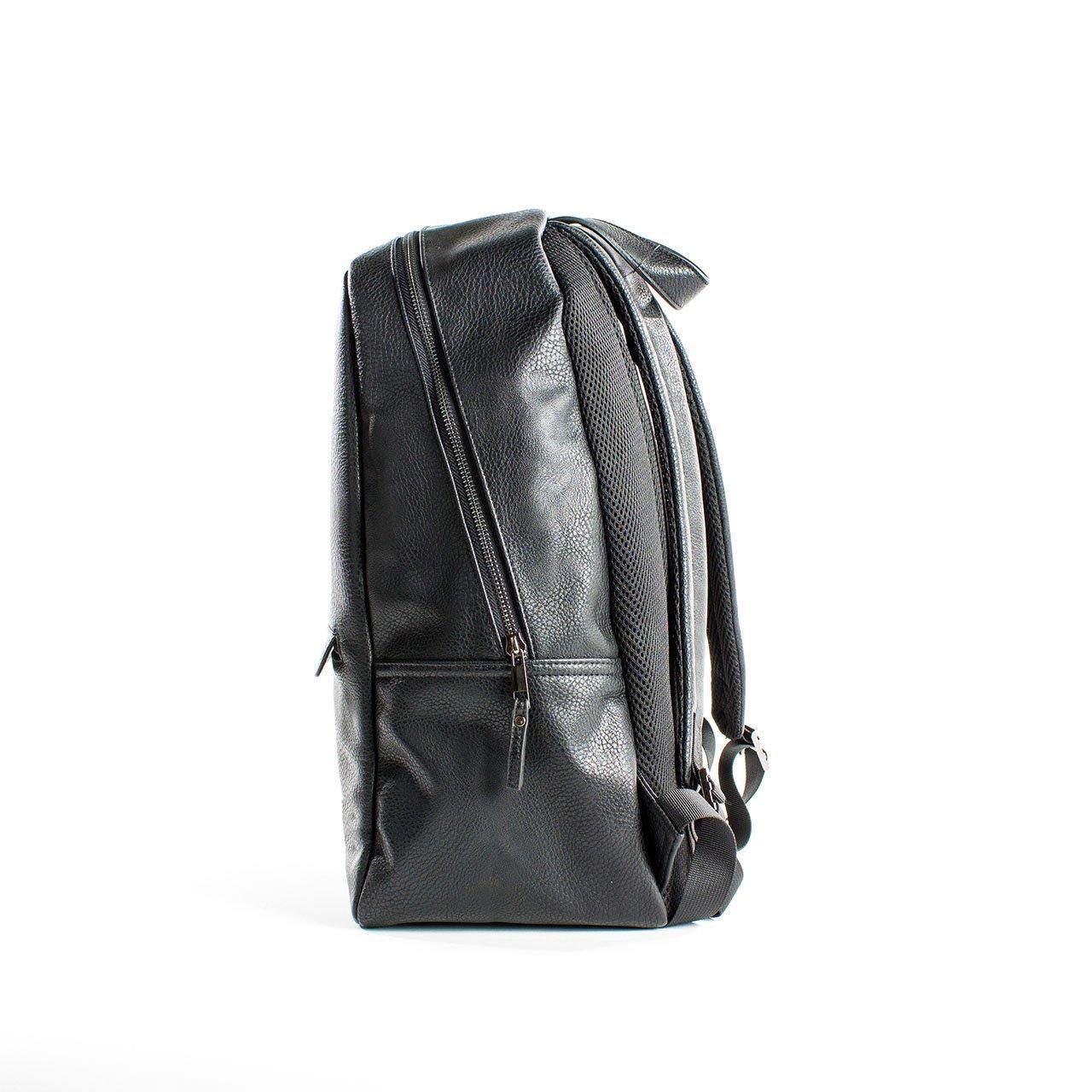 Tucker Vegan Leather Backpack featuring a sleek minimalist design, padded straps, and a soft laptop sleeve.