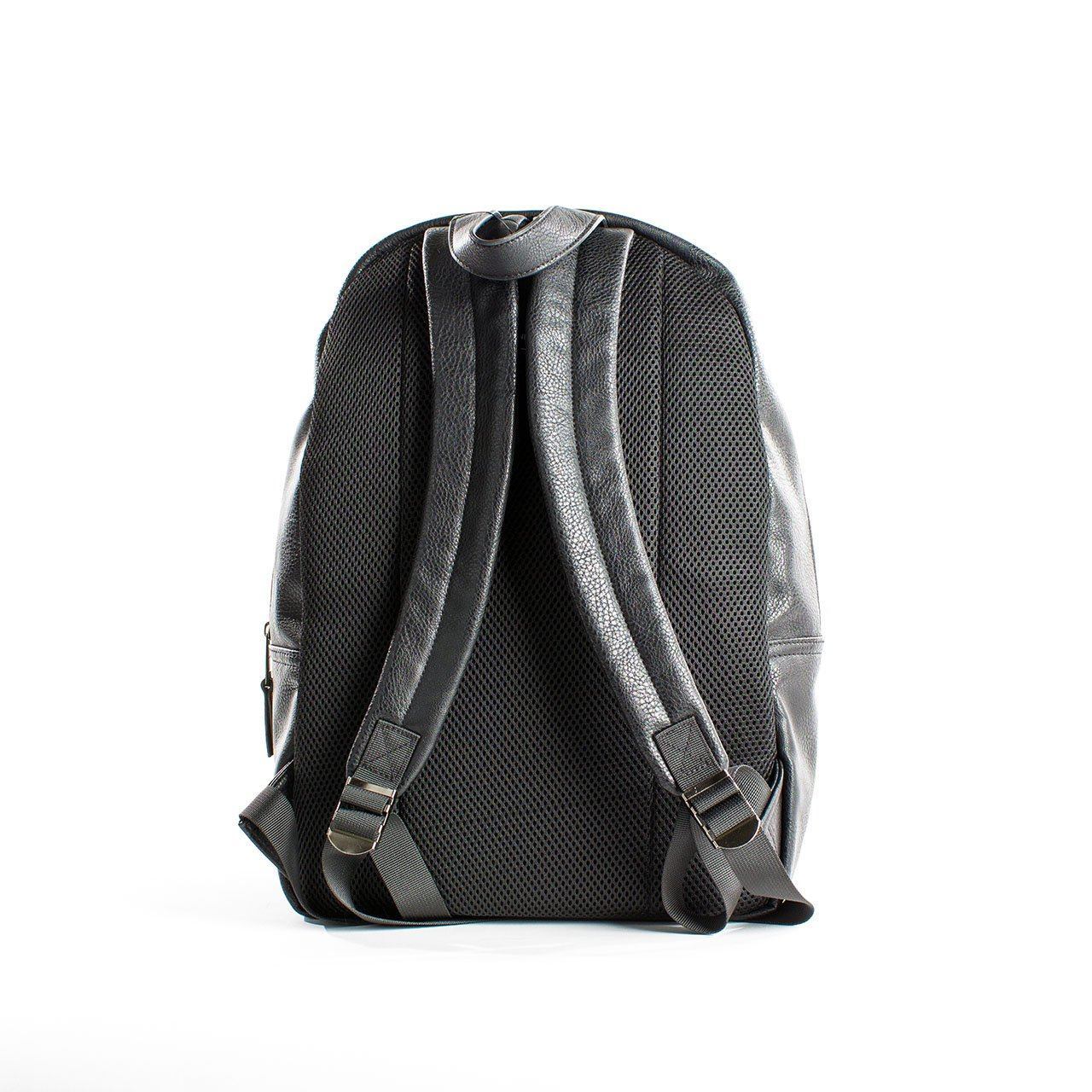 Tucker Vegan Leather Backpack featuring a sleek minimalist design, padded straps, and a soft laptop sleeve.