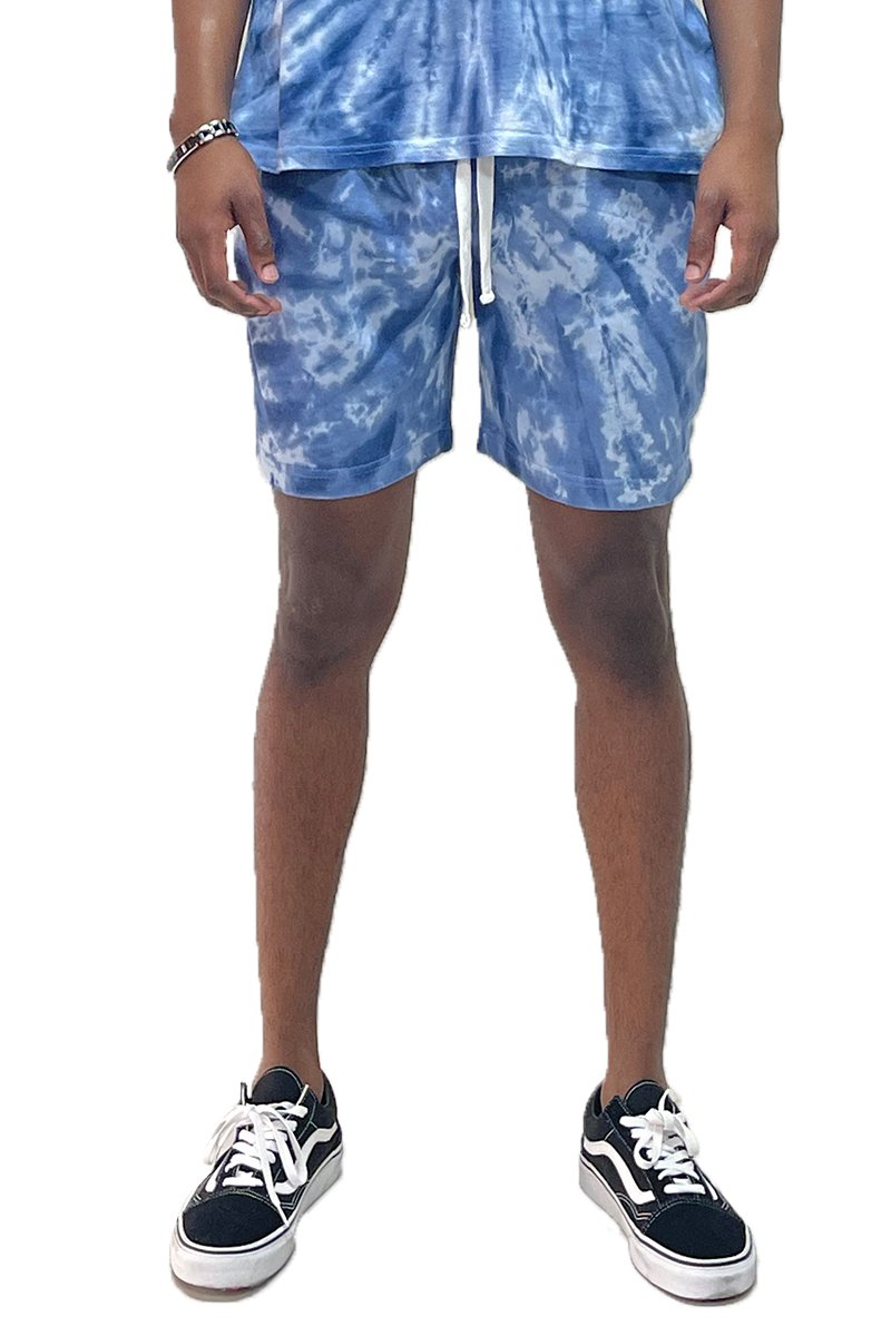 A pair of Twisted Tie Dye Shorts featuring an elastic waist, drawstring, and pockets, showcasing a vibrant tie-dye pattern.