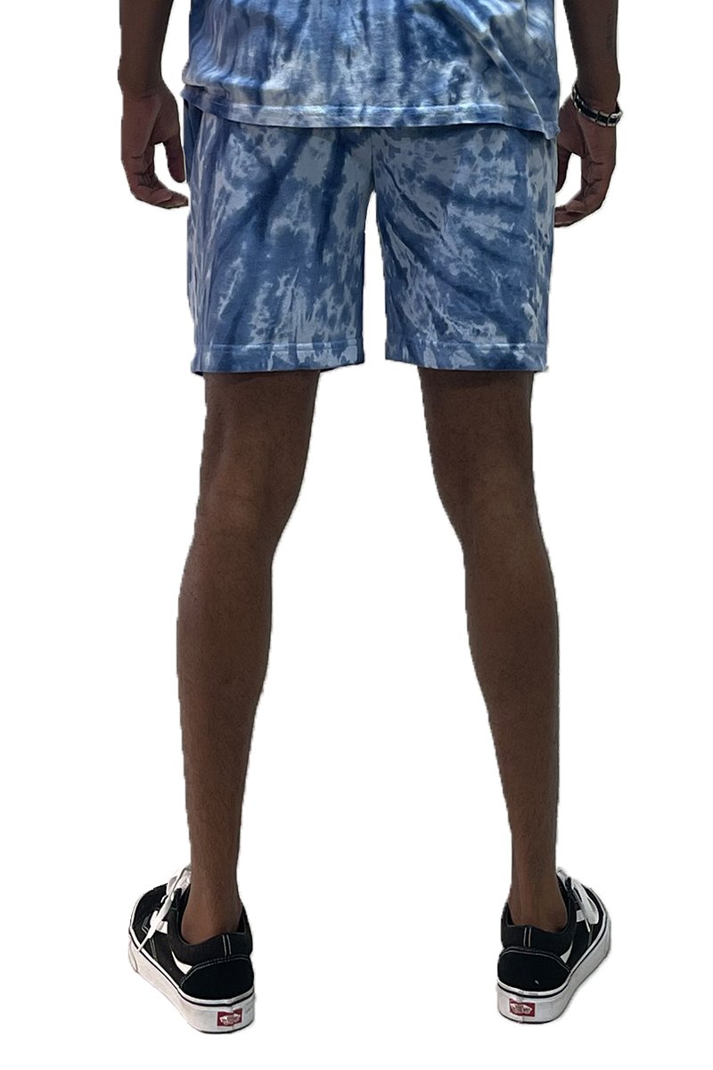 A pair of Twisted Tie Dye Shorts featuring an elastic waist, drawstring, and pockets, showcasing a vibrant tie-dye pattern.