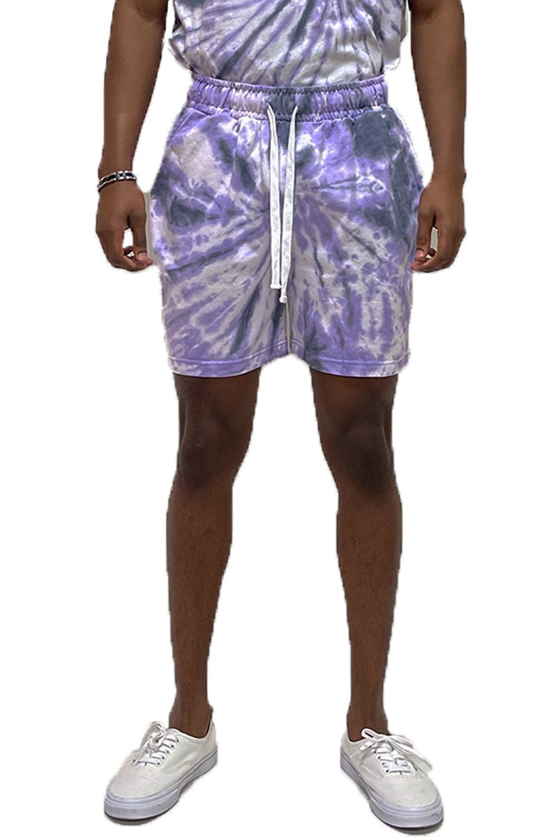 A pair of Twisted Tie Dye Shorts featuring an elastic waist and pockets, showcasing a vibrant tie-dye pattern.