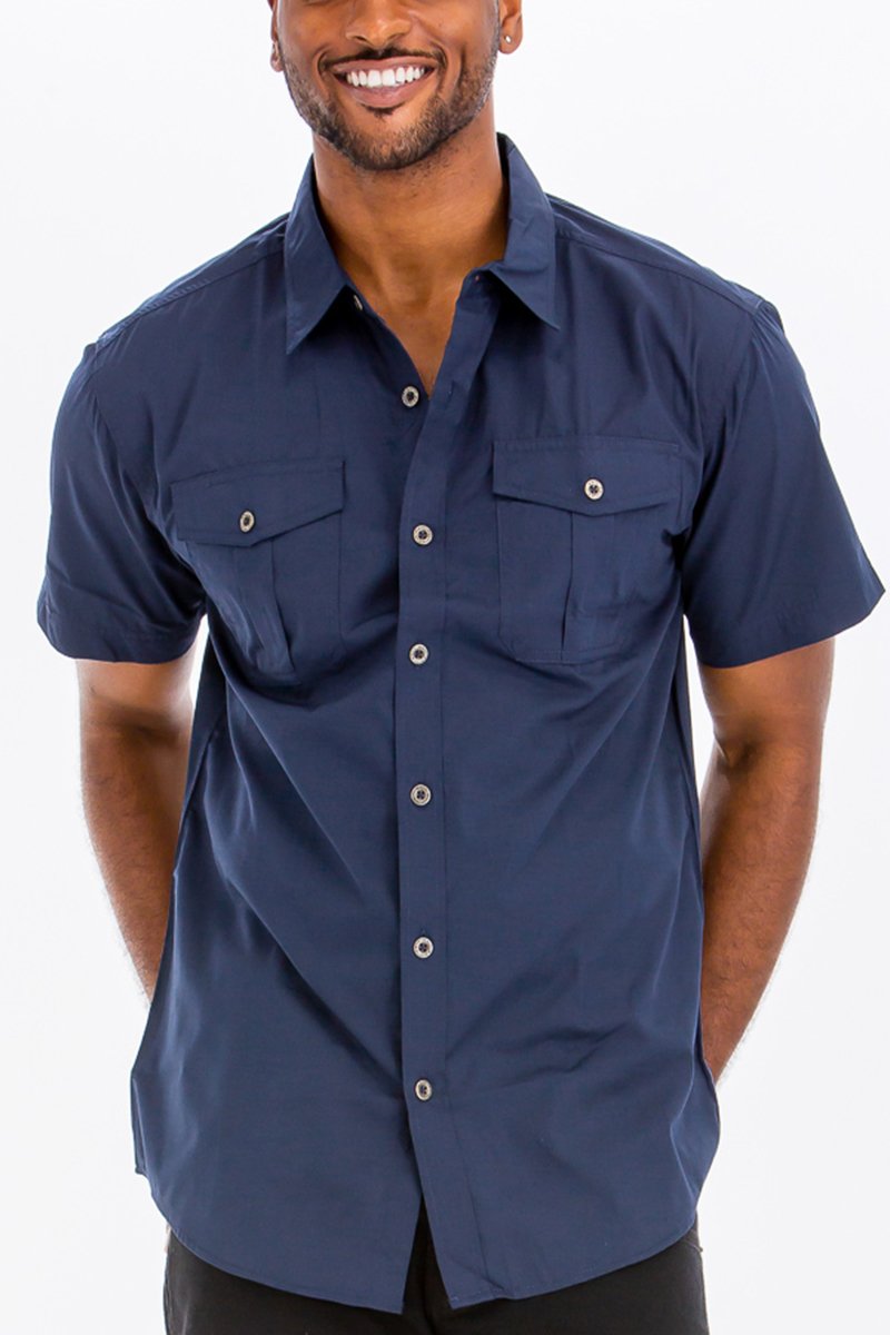 Navy Two Pocket Button Down Shirt featuring short sleeves and a round hem, made from a cotton-polyester blend.