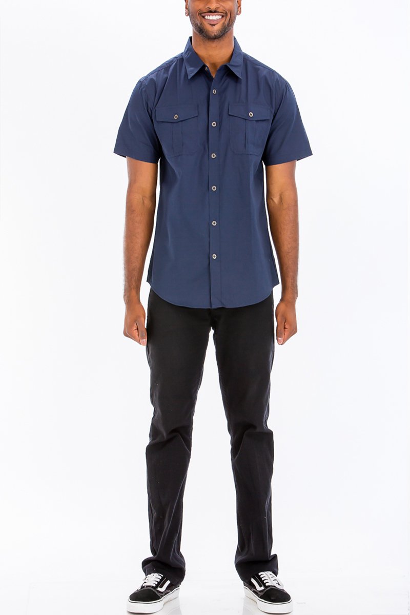 Navy Two Pocket Button Down Shirt featuring short sleeves and a round hem, made from a cotton-polyester blend.