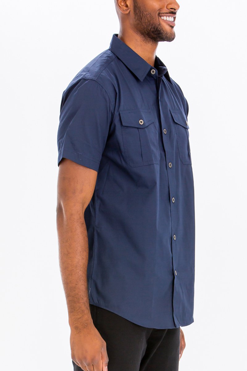 Navy Two Pocket Button Down Shirt featuring short sleeves and a round hem, made from a cotton-polyester blend.