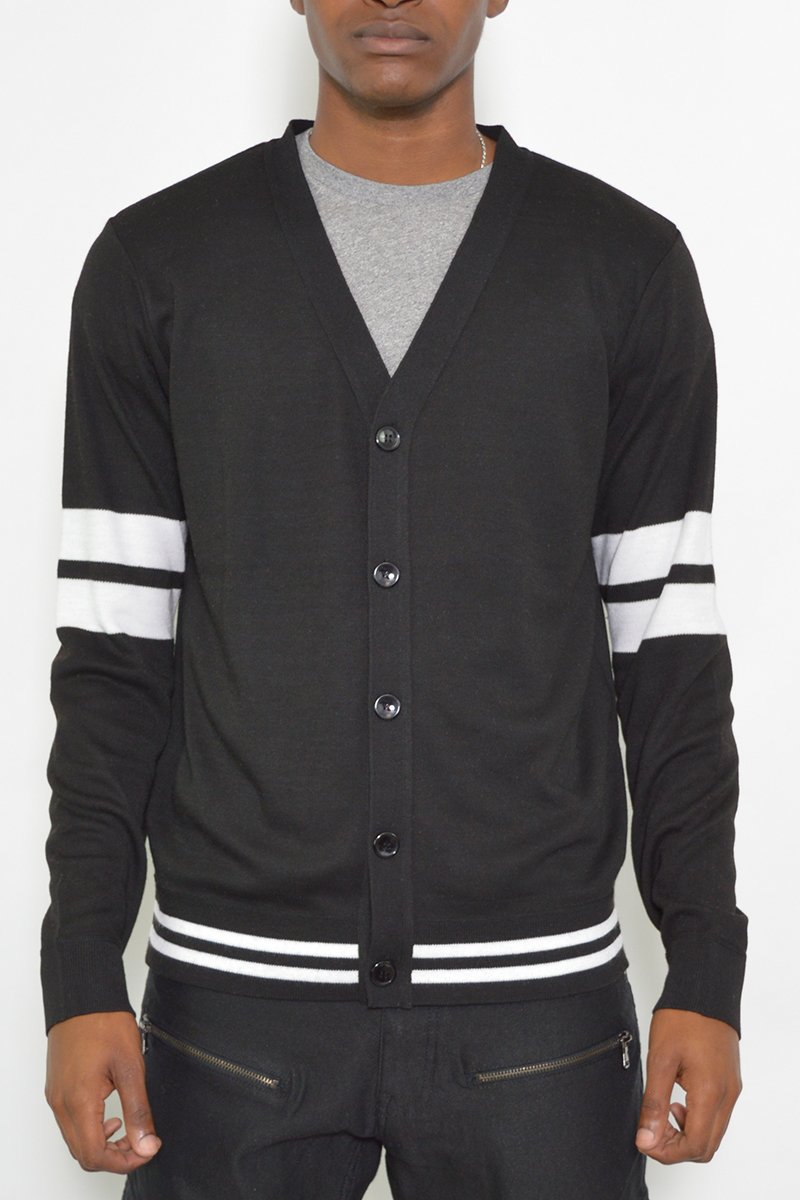 A stylish TWO STRIPE CARDIGAN featuring a modern two stripe design, made from 100% polyester, perfect for layering.