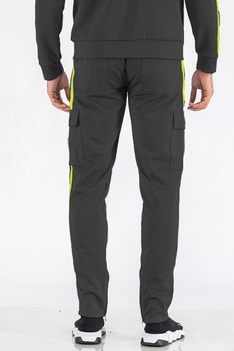 Two Stripe Cargo Pocket Track Pants featuring an elastic waist, ankle zippers, and Velcro closure pockets in a stylish design.