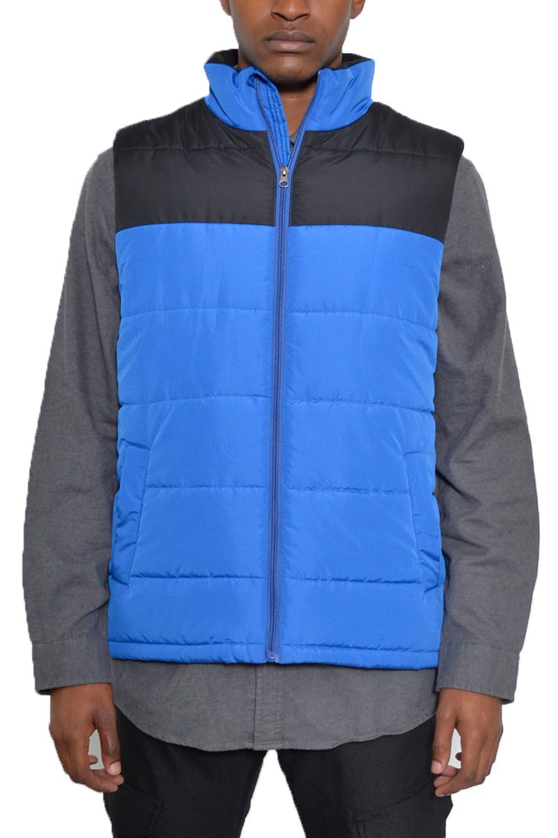 A stylish two-tone padded vest made of 100% polyester, featuring a modern design suitable for layering.