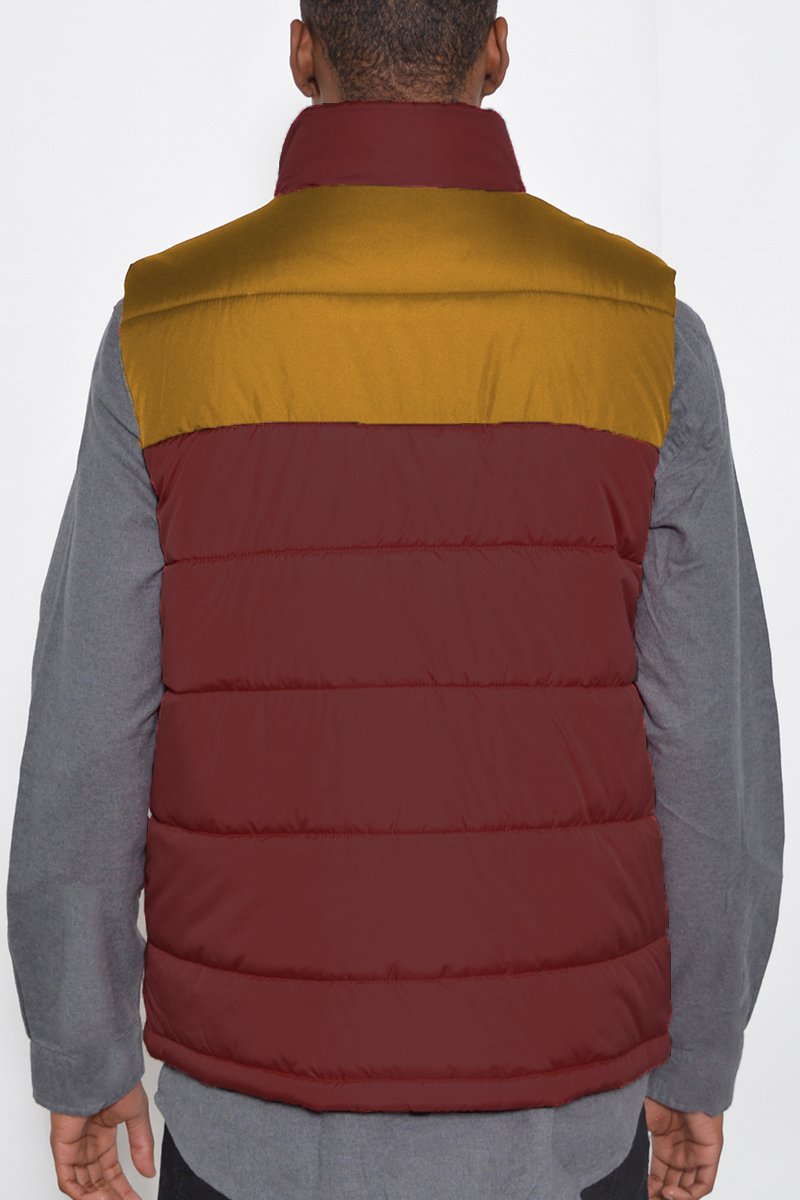 Two Tone Padded Vest displayed on a mannequin, showcasing its stylish design and padded texture.