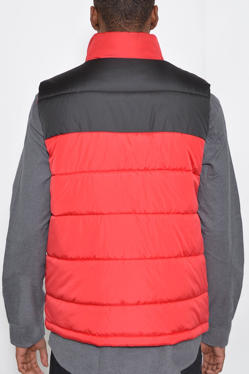 Two Tone Padded Vest displayed on a mannequin, showcasing its stylish design and padded texture.