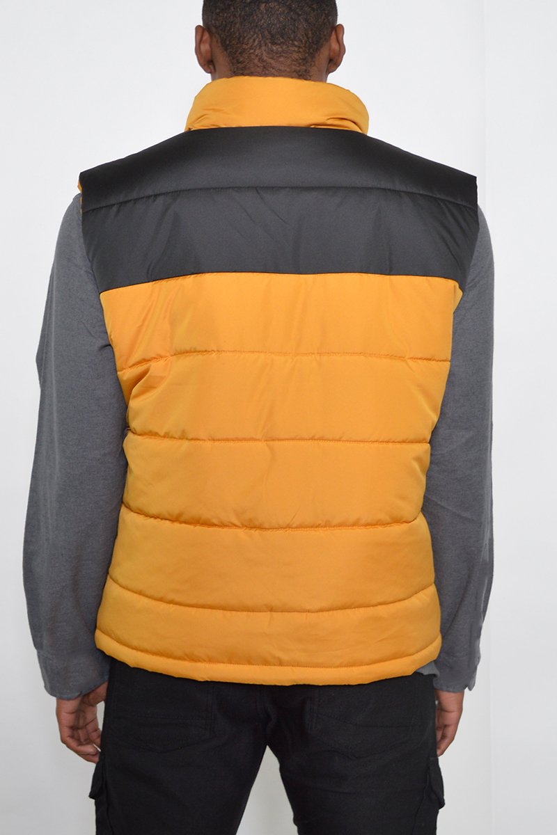 Two Tone Padded Vest displayed on a mannequin, showcasing its stylish design and lightweight material.