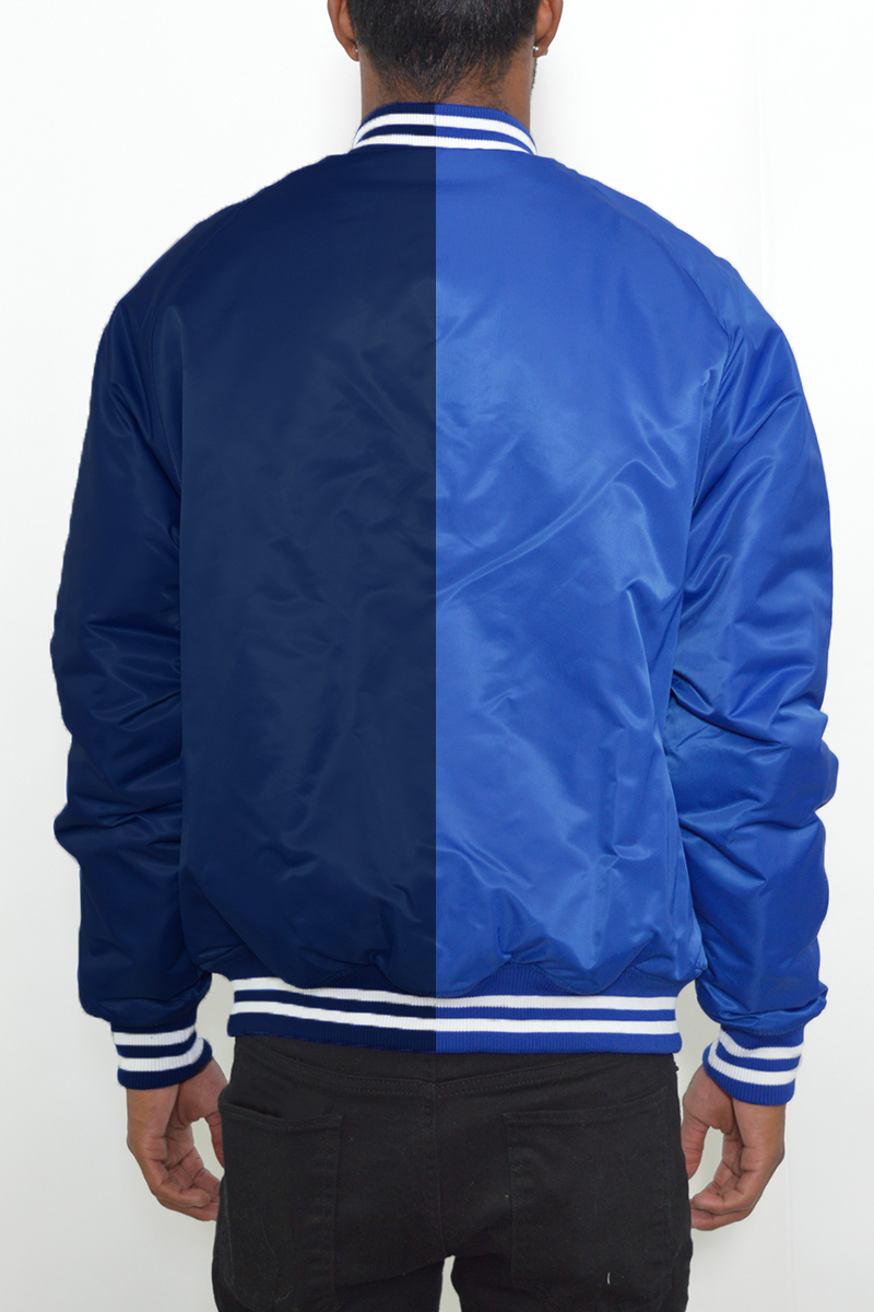 Two Tone Varsity Bomber Jacket featuring a stylish split design, ribbed collar, and snap button closure.