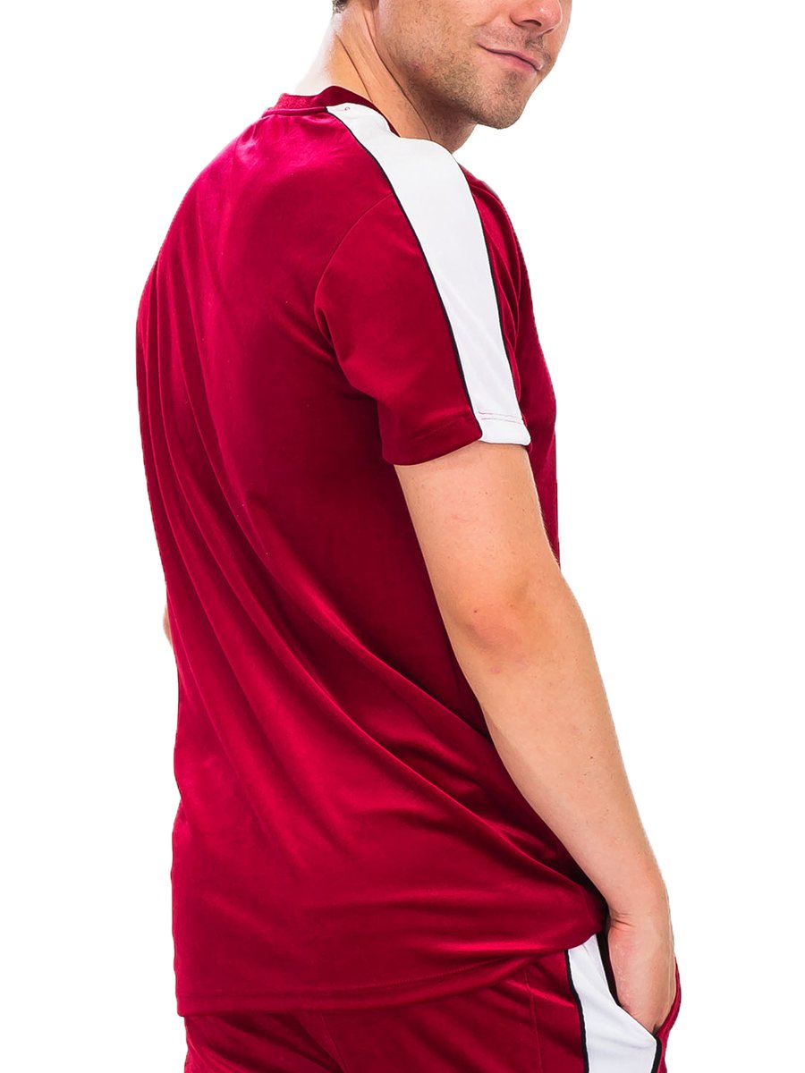 A stylish velvet T-shirt featuring soft velour fabric and elegant piping detail, displayed on a mannequin.