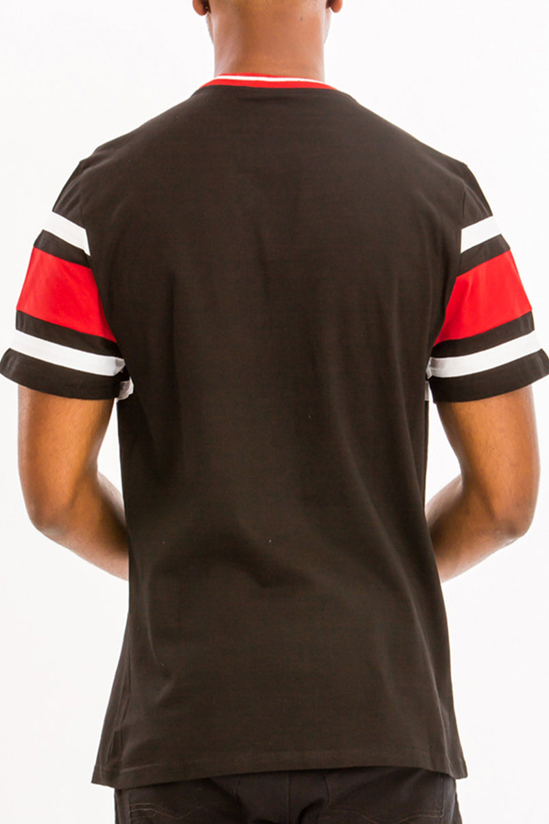 A stylish Vertical Color Block Tee made of 100% cotton, featuring vibrant vertical stripes in multiple colors.