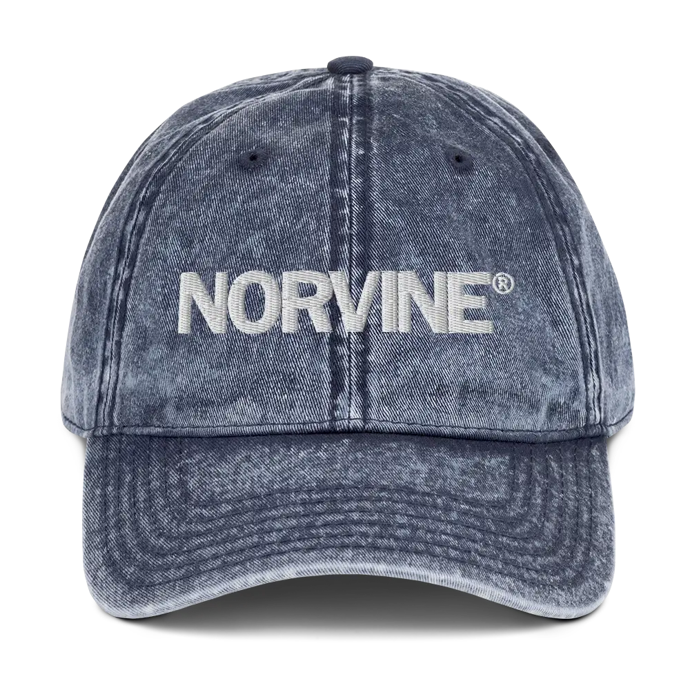 Vintage Cotton Twill Cap with intricate embroidery and washed-out effect, featuring a low profile and antique brass buckle.