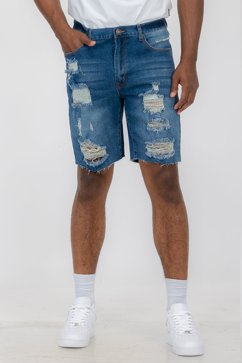 A pair of washed distressed denim shorts featuring a button closure waist and standard pockets, styled for a casual summer look.