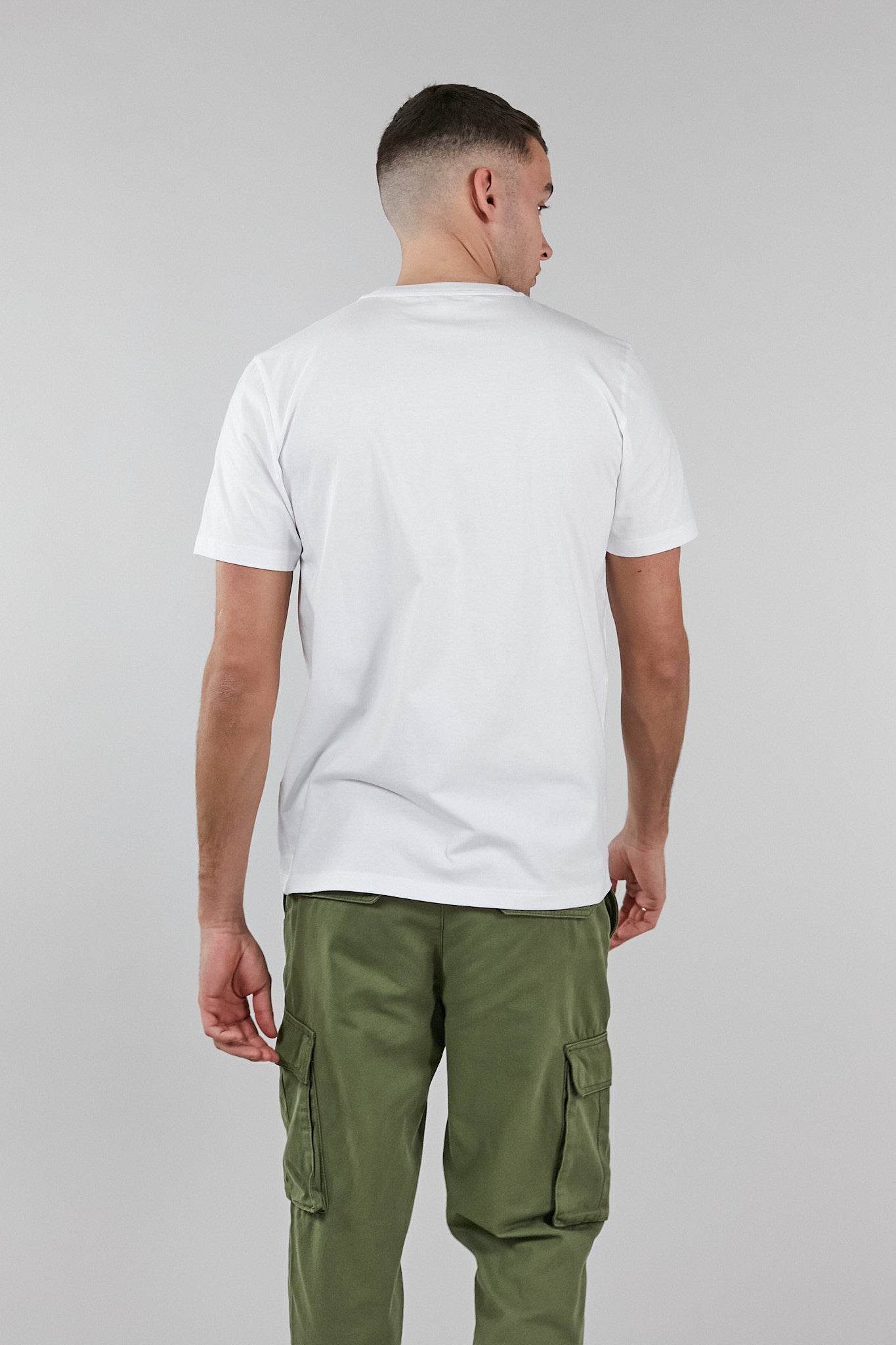 A soft touch white low carbon t-shirt made from 100% organic cotton with an embroidered altid logo.