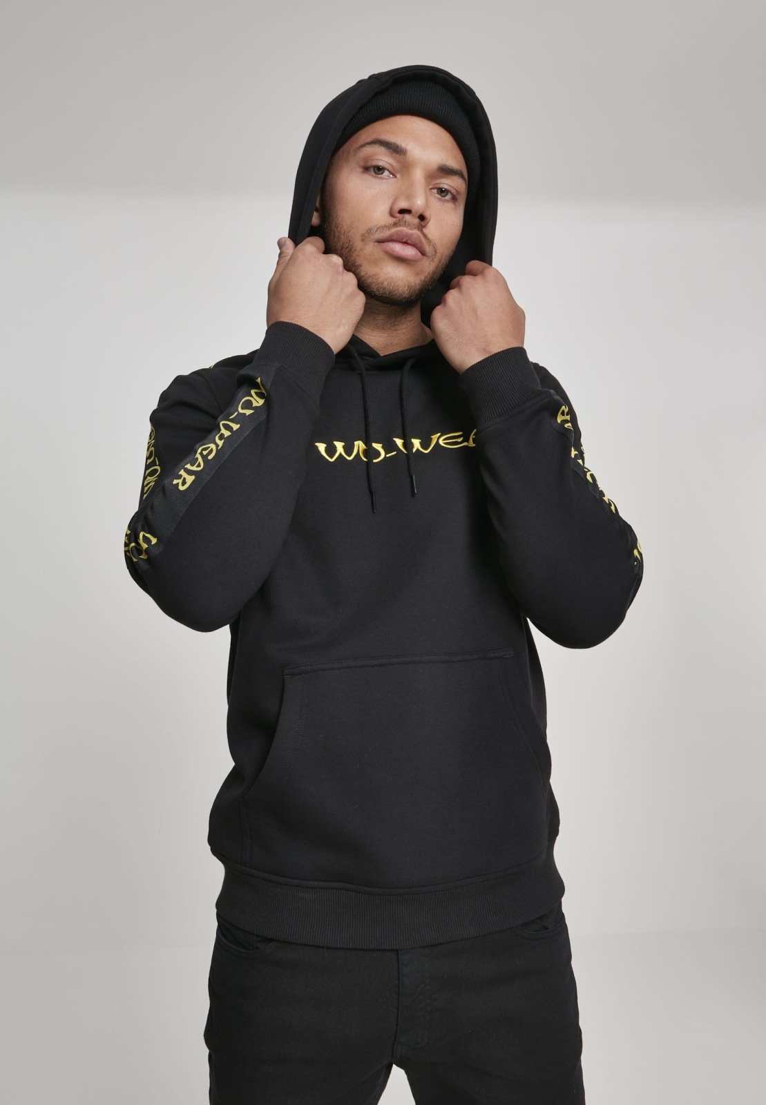 Wu-Wear Tape Hoodie featuring unique sidetape and front embroidery, crafted from soft half brushed fleece fabric.