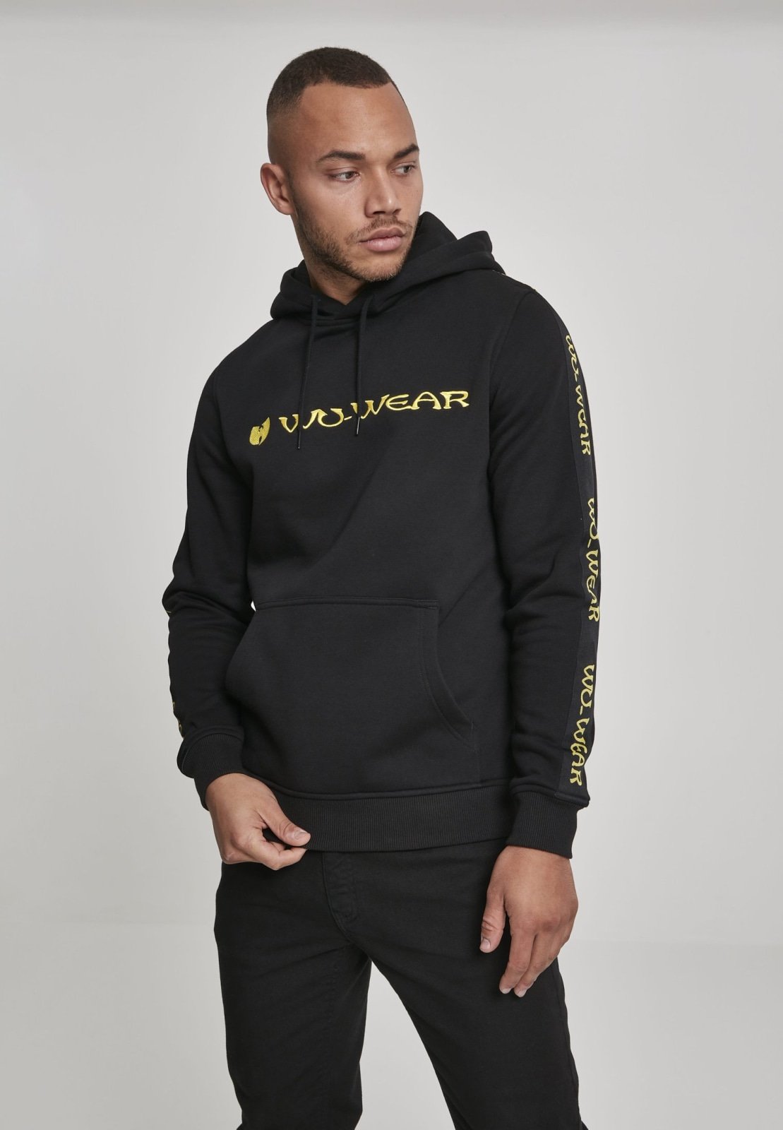 Wu-Wear Tape Hoodie featuring unique sidetape and front embroidery, crafted from soft half brushed fleece fabric.