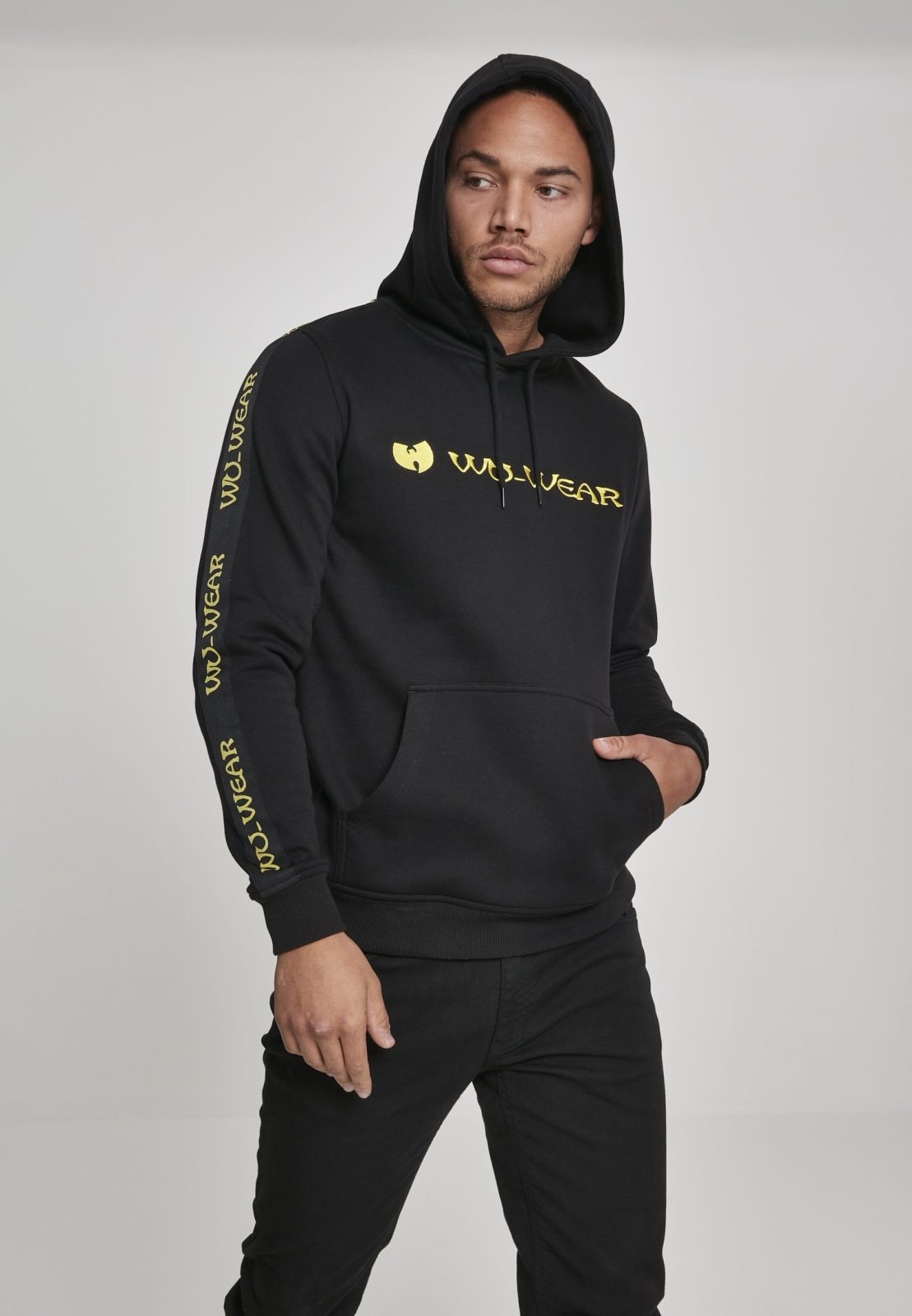 Wu-Wear Tape Hoodie featuring unique sidetape and front embroidery, crafted from soft half brushed fleece fabric.