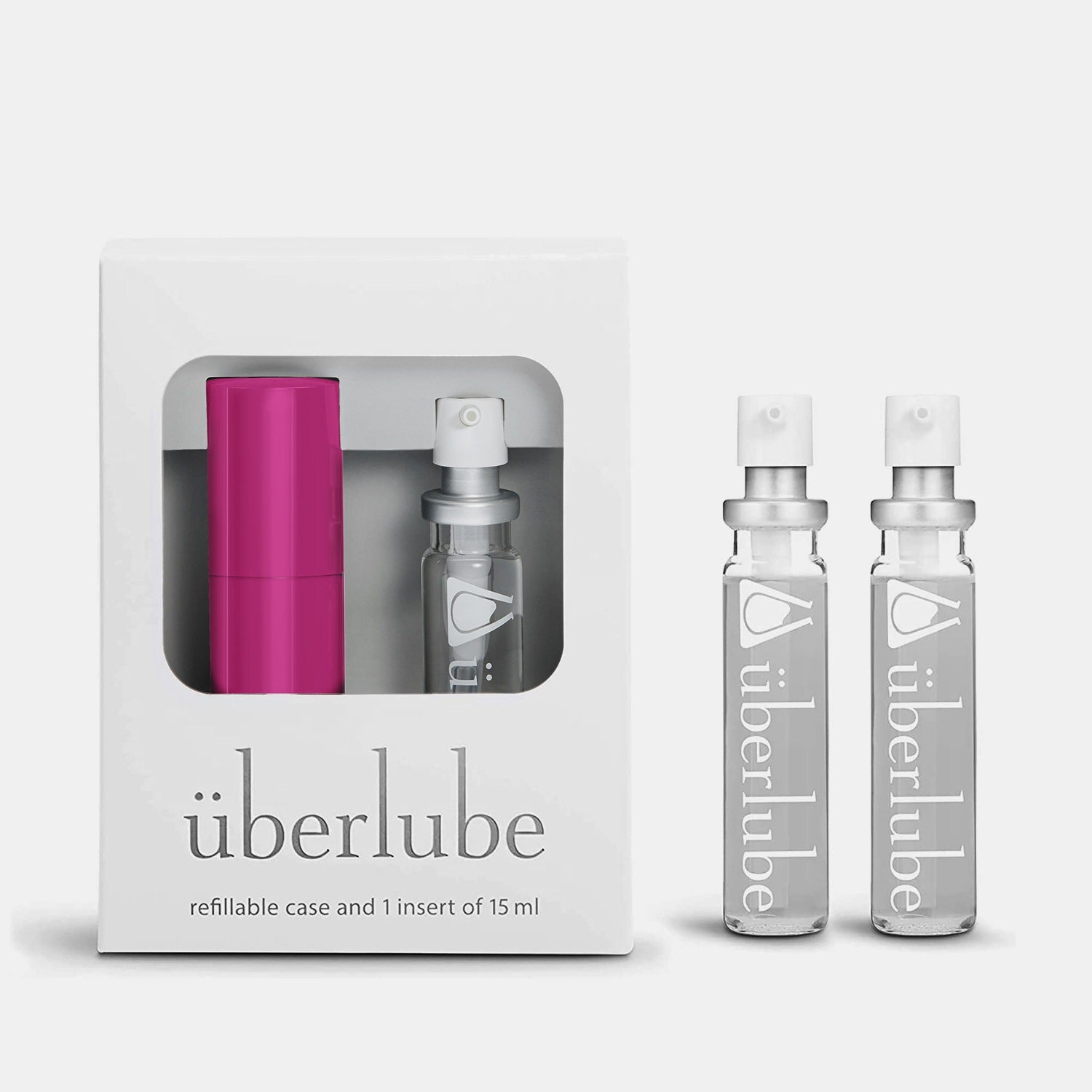 überlube Pink Good-to-Go Traveler Set with black metal case and three 15ml lubricant refills, perfect for travel.