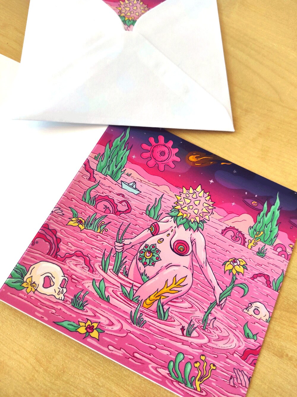 A beautifully designed Birth Greeting Card featuring surreal universes, perfect for new mums, with a recycled envelope.