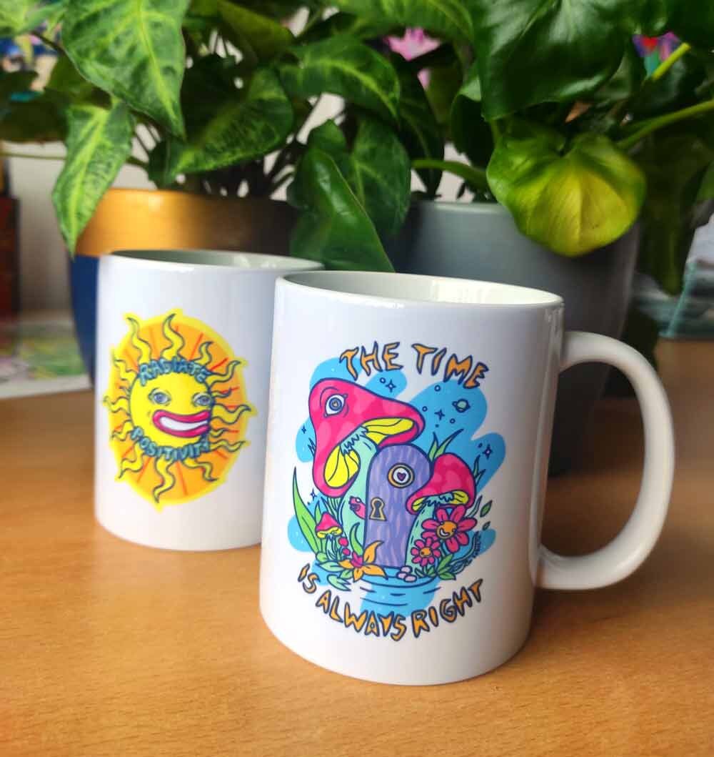 Ceramic mug with colorful design 'The Time Is Always Right', showcasing its vibrant print and sturdy handle.