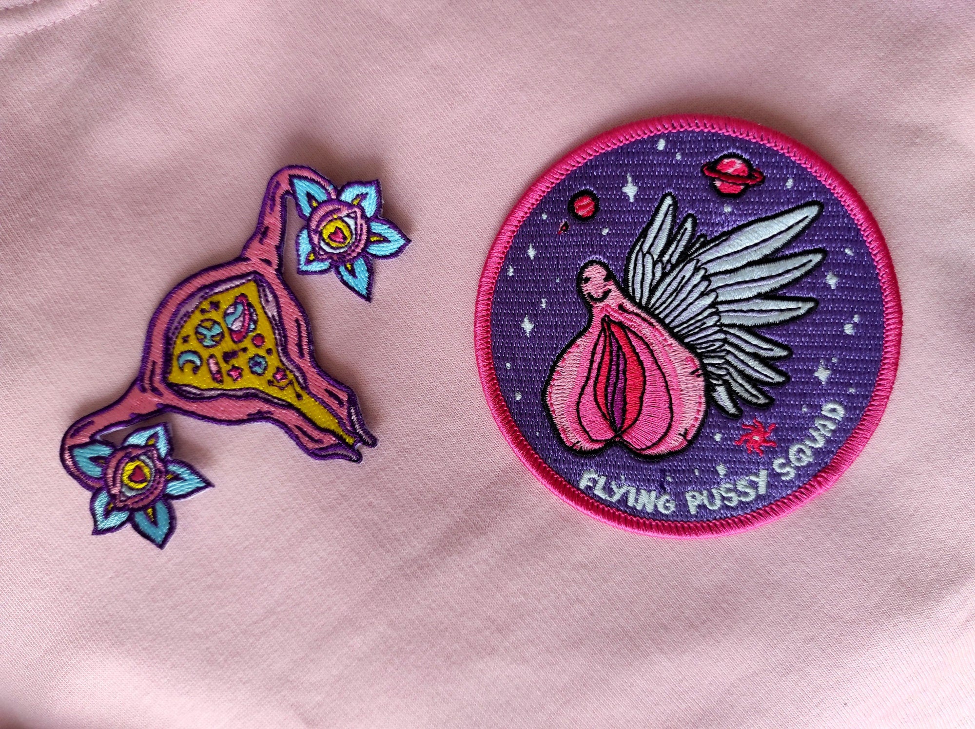 Cosmic Uterus Patch featuring a psychedelic embroidered design in six vibrant colors, measuring 12.5cm x 12.5cm.