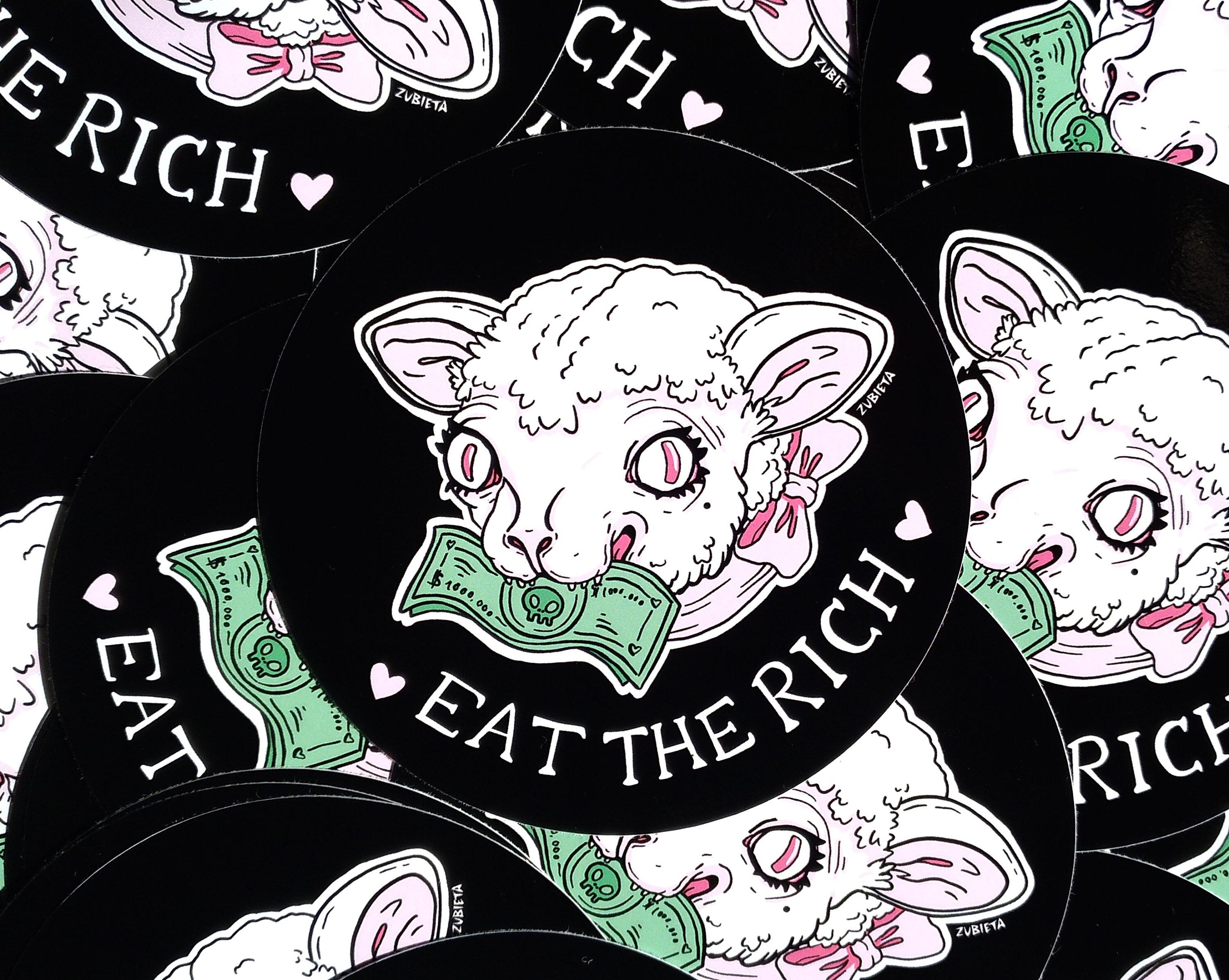 Cute Evil Sticker Pack featuring 'Eat the Rich' and 'Snitches Get Stitches' designs on high-quality vinyl.