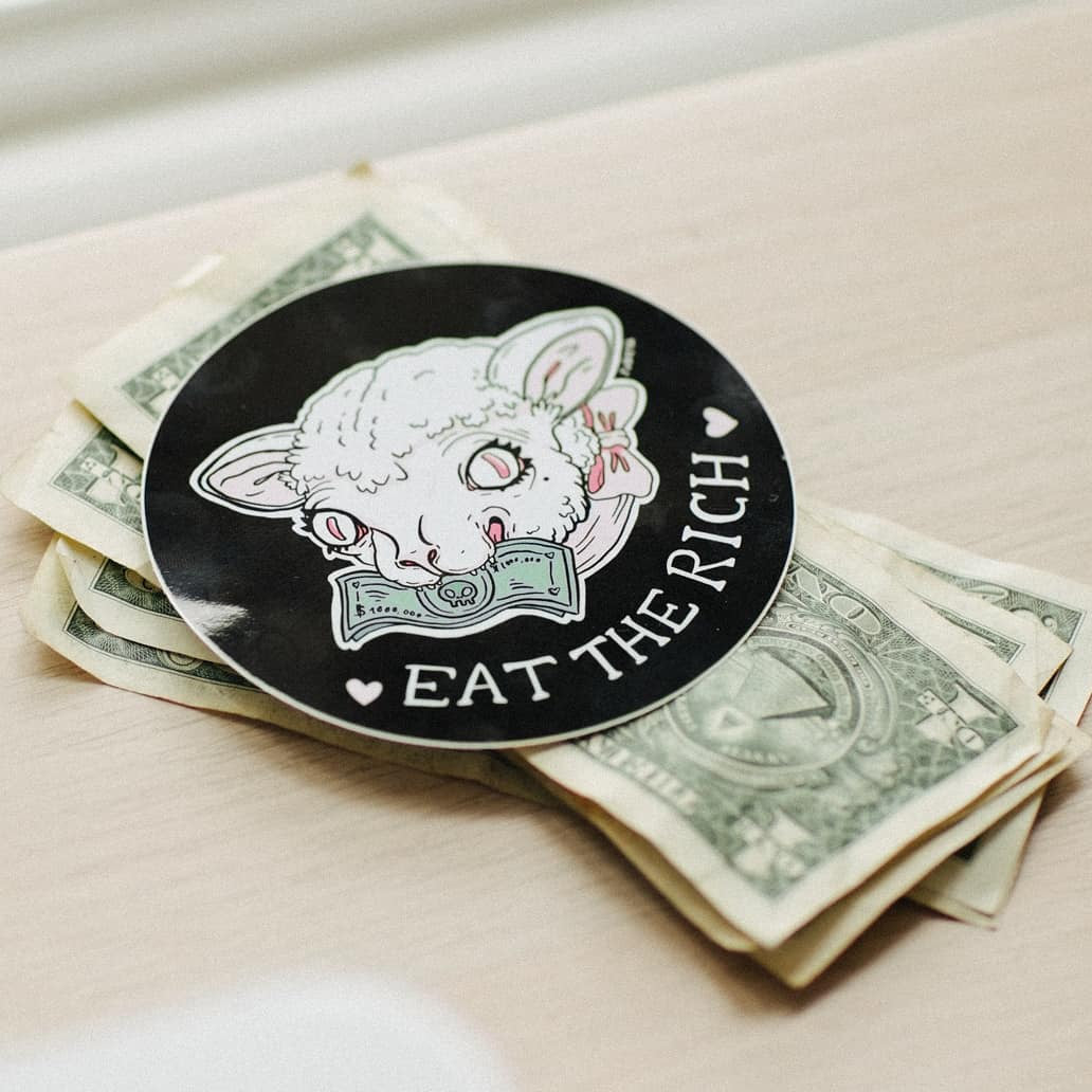 Cute Evil Sticker Pack featuring 'Eat the Rich' and 'Snitches Get Stitches' designs on high-quality vinyl.