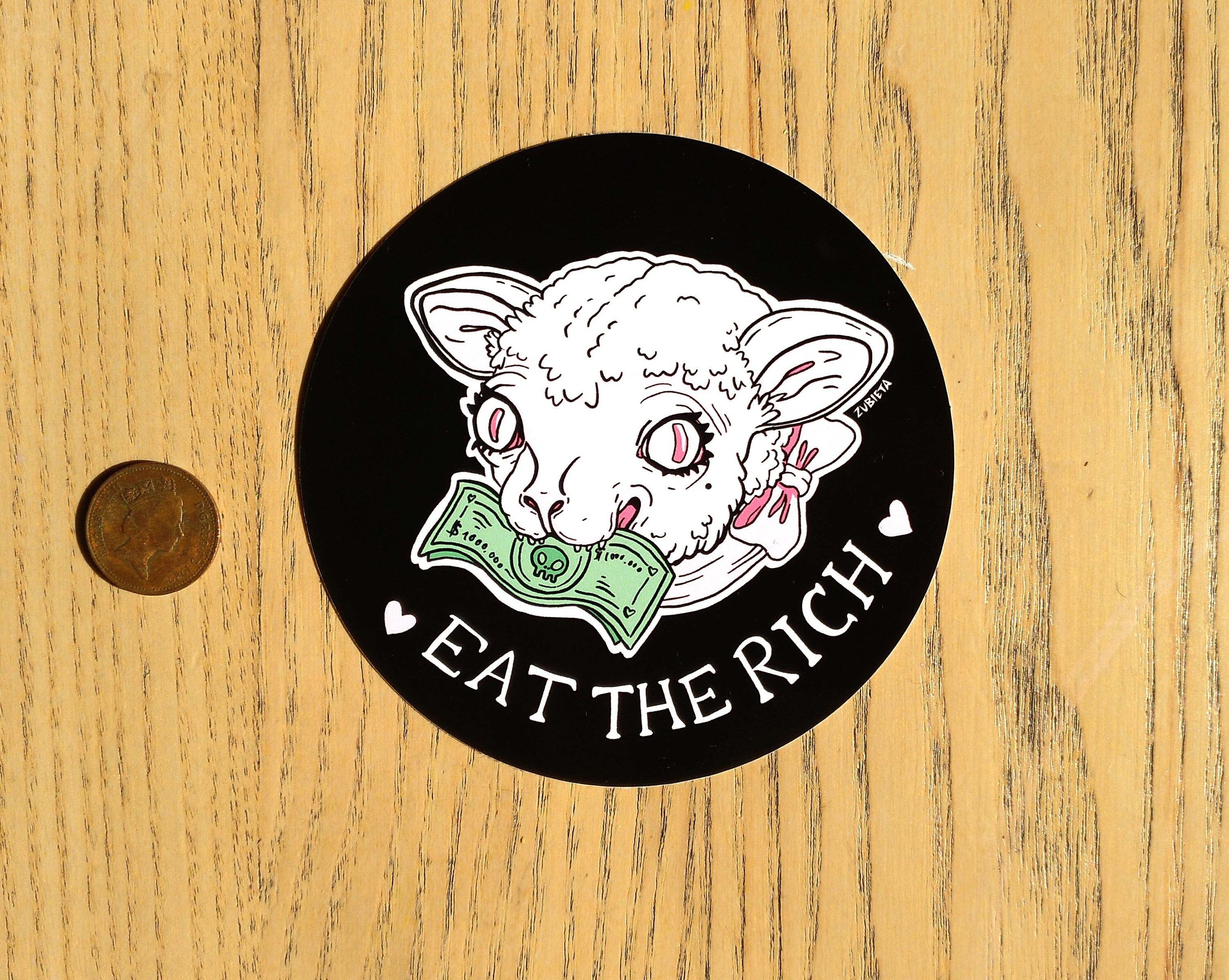 Cute Evil Sticker Pack featuring 'Eat the Rich' and 'Snitches Get Stitches' designs on high-quality vinyl.