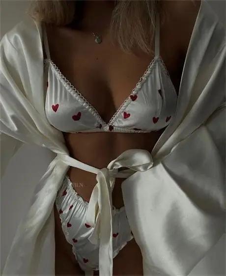 DEMURE 2 Piece Satin White Lingerie Set featuring a soft strappy bralette and comfy thong bottoms, elegantly displayed.