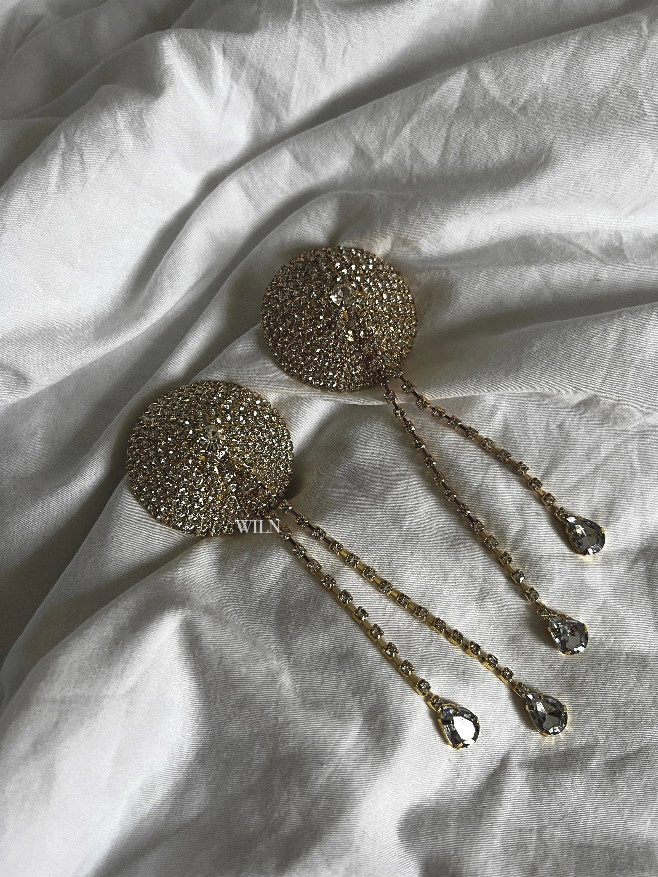 Gorgeous DIAMANTE Gold Nipple Covers with tassel design, showcasing high-quality rhinestones for a bold and alluring look.