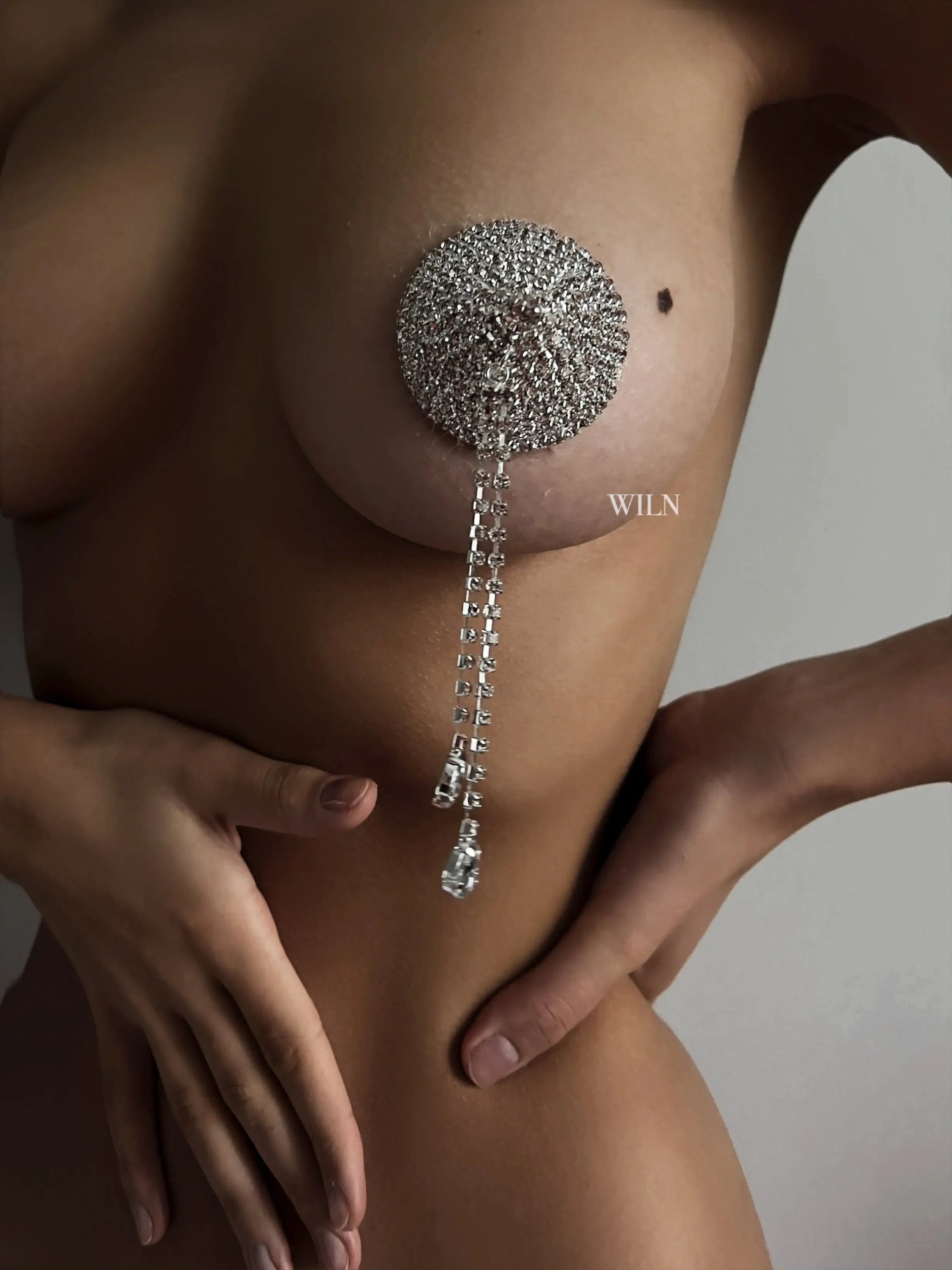 DIAMANTE Silver Nipple Covers with diamante tassels, showcasing their exquisite design and craftsmanship.