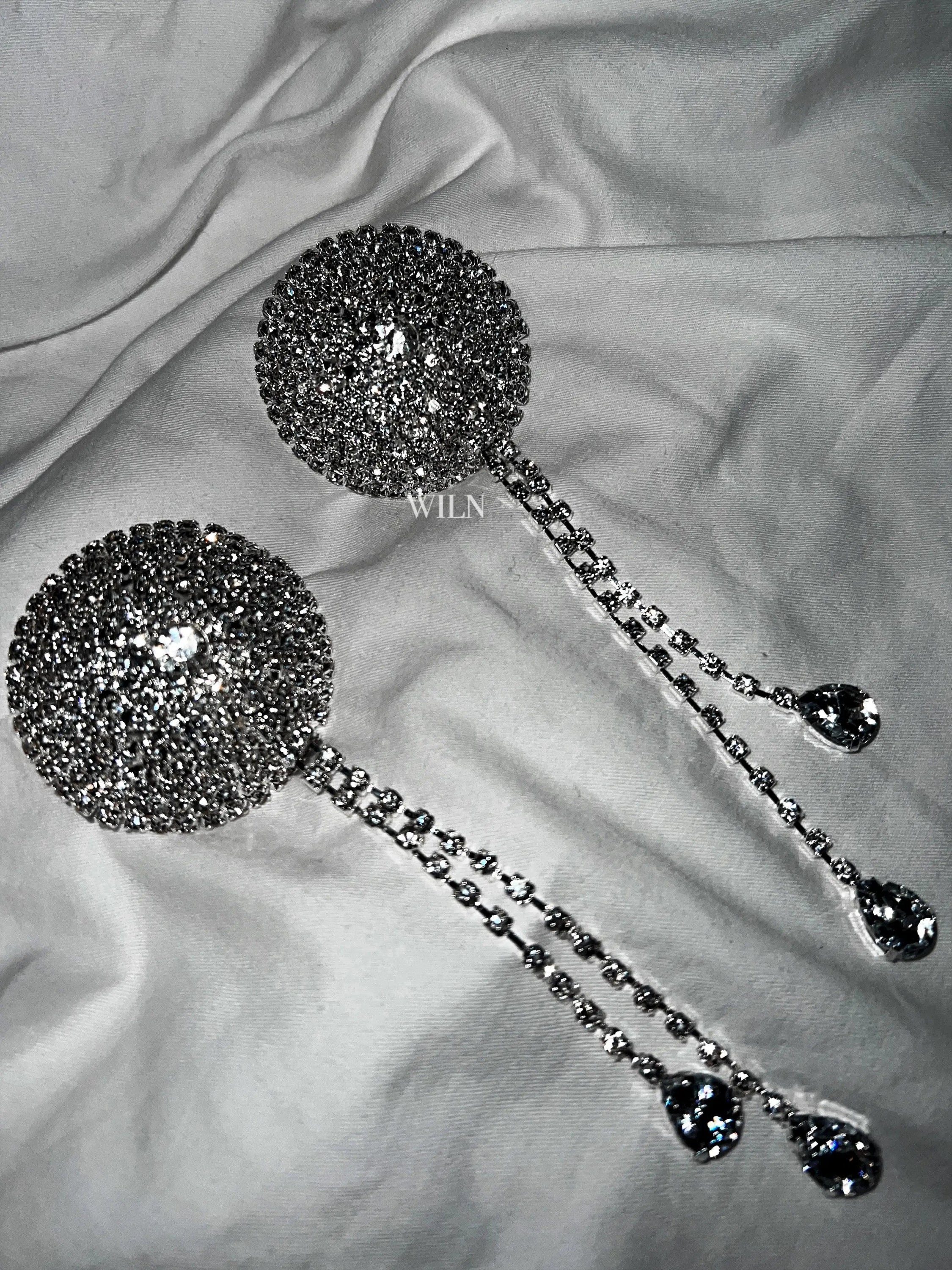 DIAMANTE Silver Nipple Covers with diamante tassels, showcasing their exquisite design and craftsmanship.