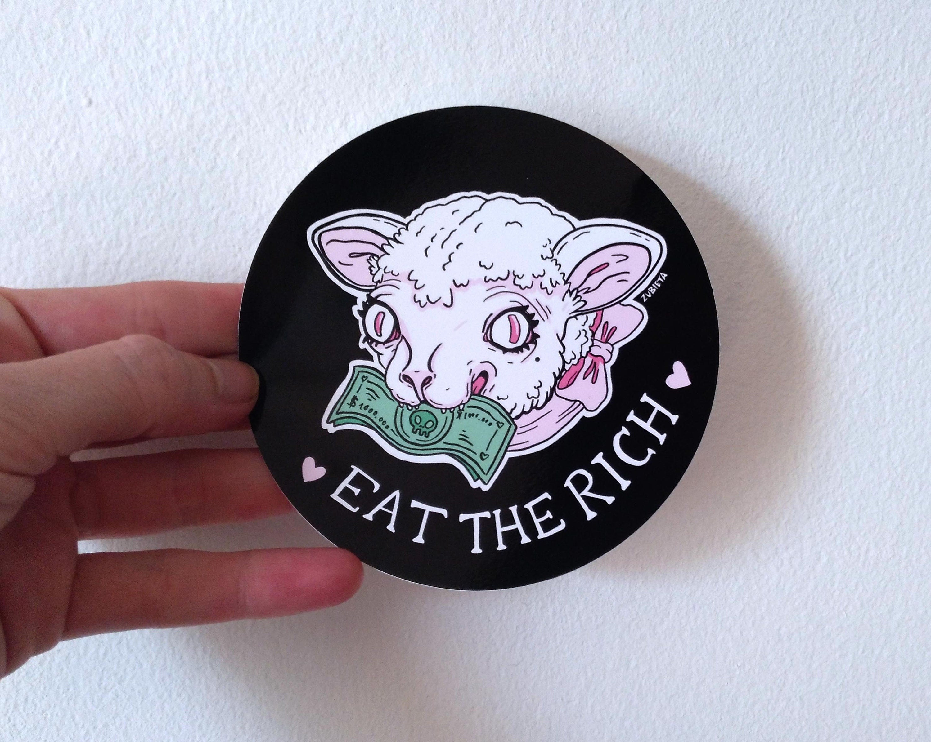 Eat the Rich Sticker featuring a round design with bold text and vibrant colors, perfect for personalizing laptops and water bottles.