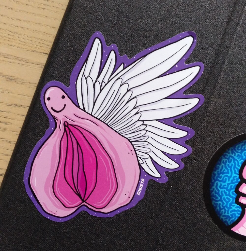 A whimsical sticker featuring a cat with wings flying through space, designed by Zubieta.