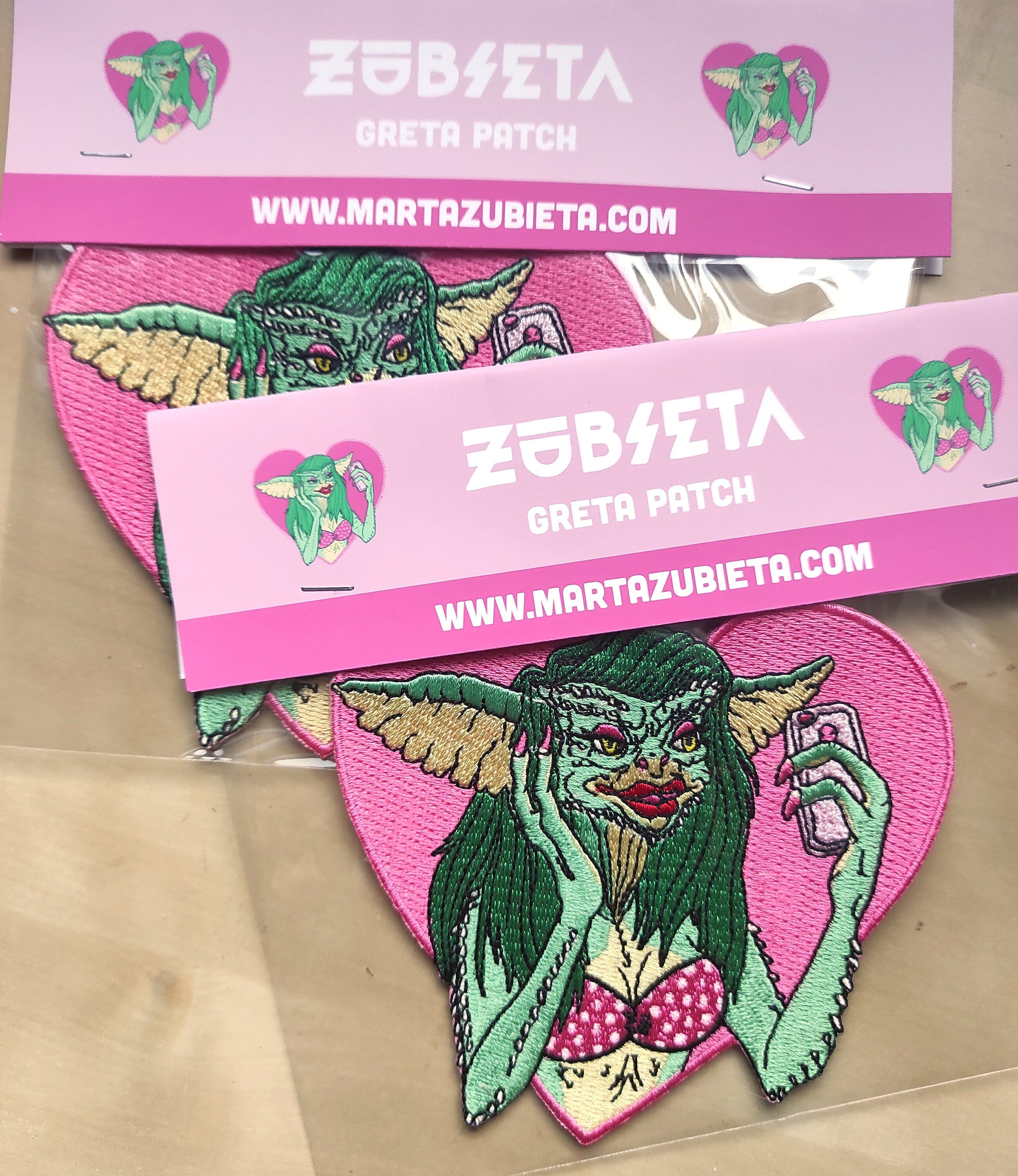 Greta The Gremlin Embroidered Patch featuring vibrant colors and playful design, measuring 12.5cm x 12.5cm.