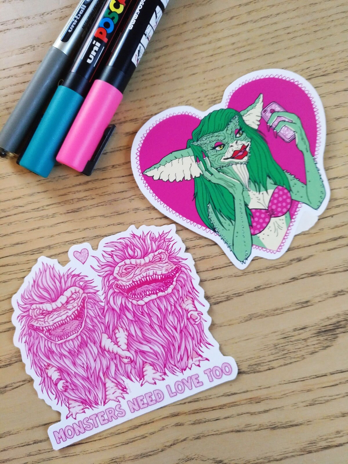 Greta The Gremlin Sticker featuring a cute gremlin design, perfect for decorating laptops and notebooks.